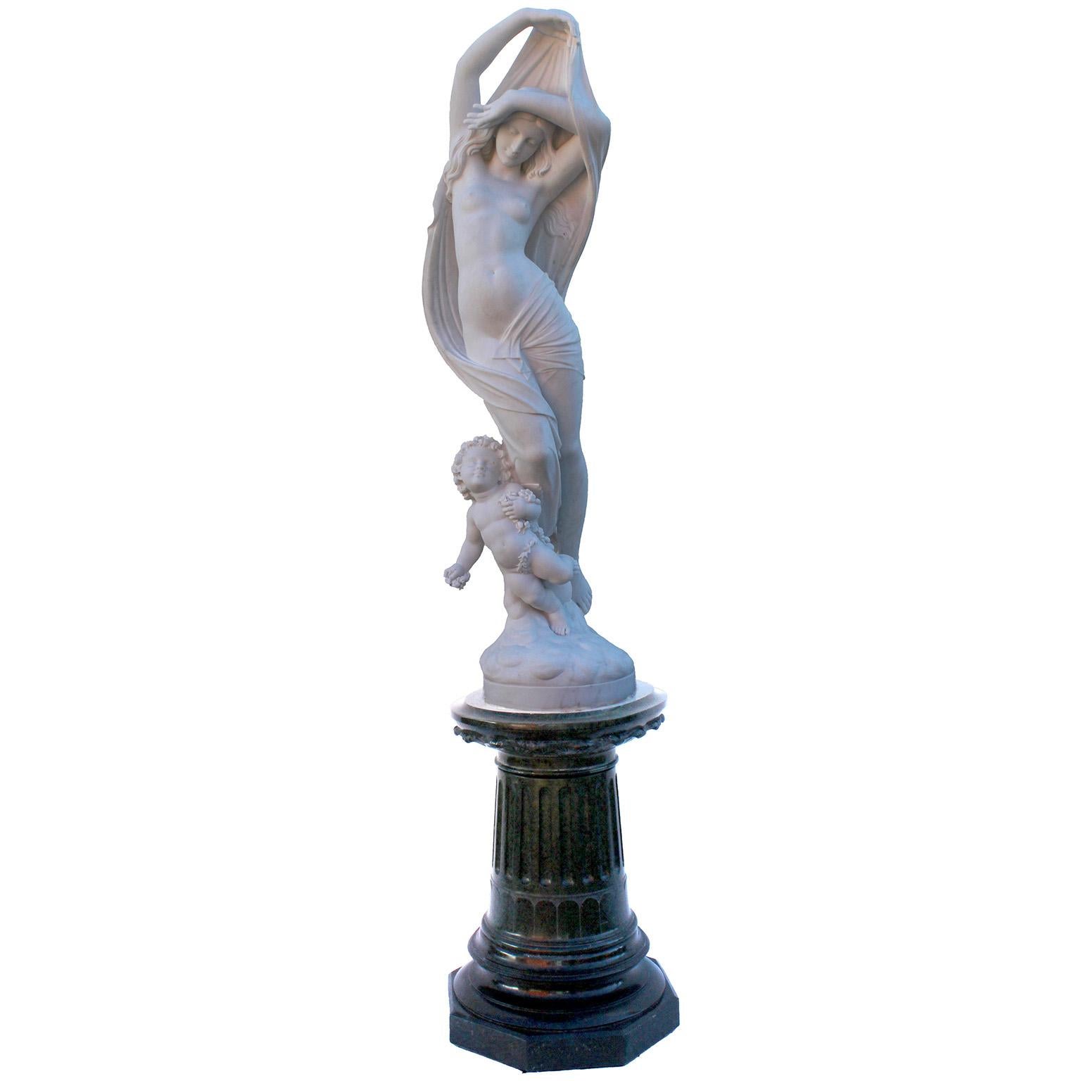 A large beautifully carved white marble sculpture of 
