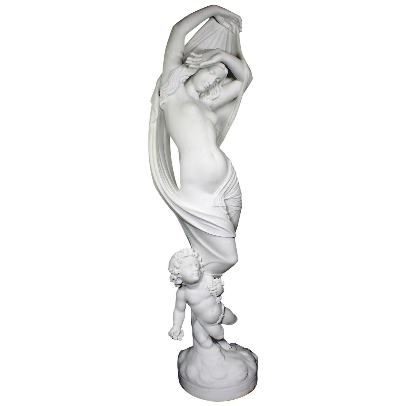 Large Carved White Marble Sculpture of "Venus and Cupid", After the Antique For Sale