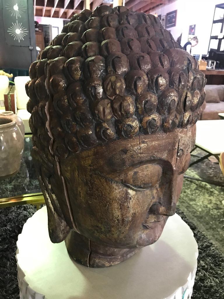 wooden buddha head