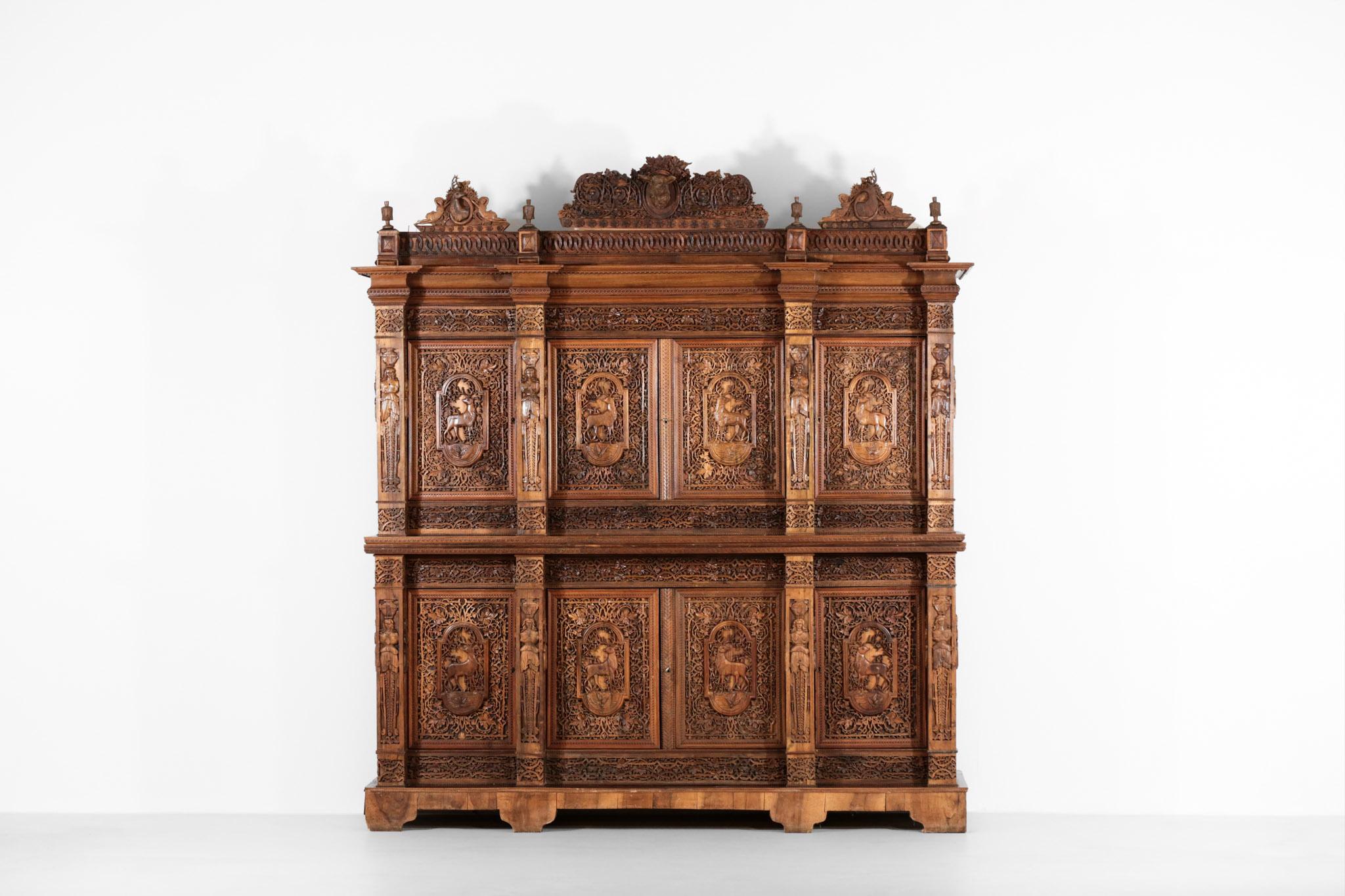 Unique piece, amazing cabinet made by a passionate cabinet maker. Really nice carved wood work. Old documentation about it on request.