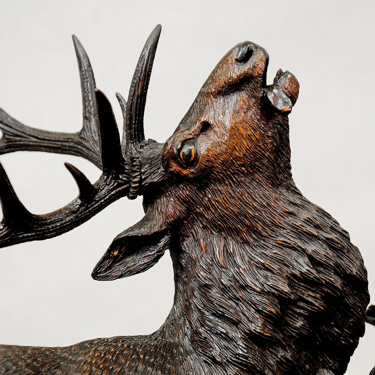 Rustic Large Carved Wood Fighting Stags by Rudolph Heissl