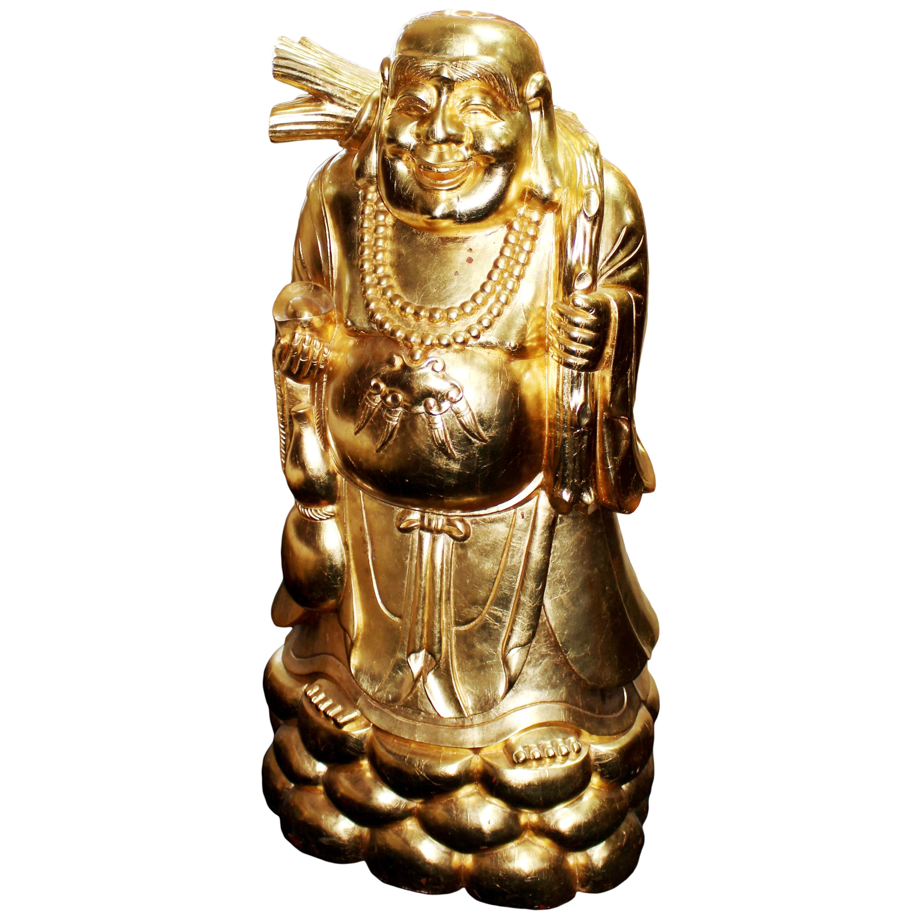 Large Carved Wood Gold Leaf Laughing Buddha on Rocks For Sale
