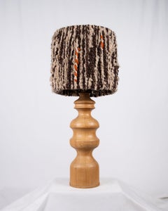 Large carved wood lamp with wool lampshade, French work from the 1960s