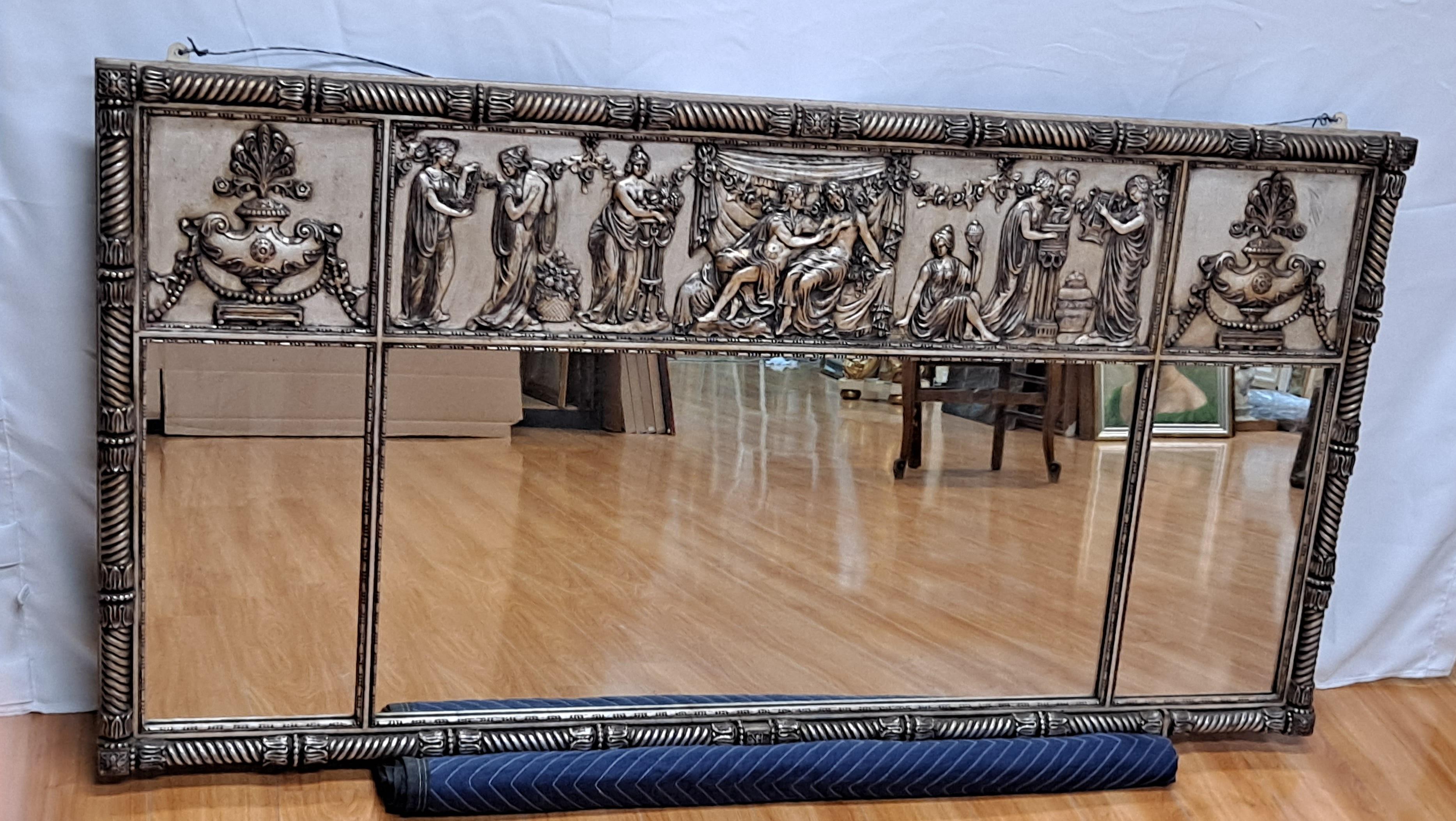 Large Carved Wood Silvered Classical Mirror With Roman-Style Decoration

32h x 2.25d x 62l