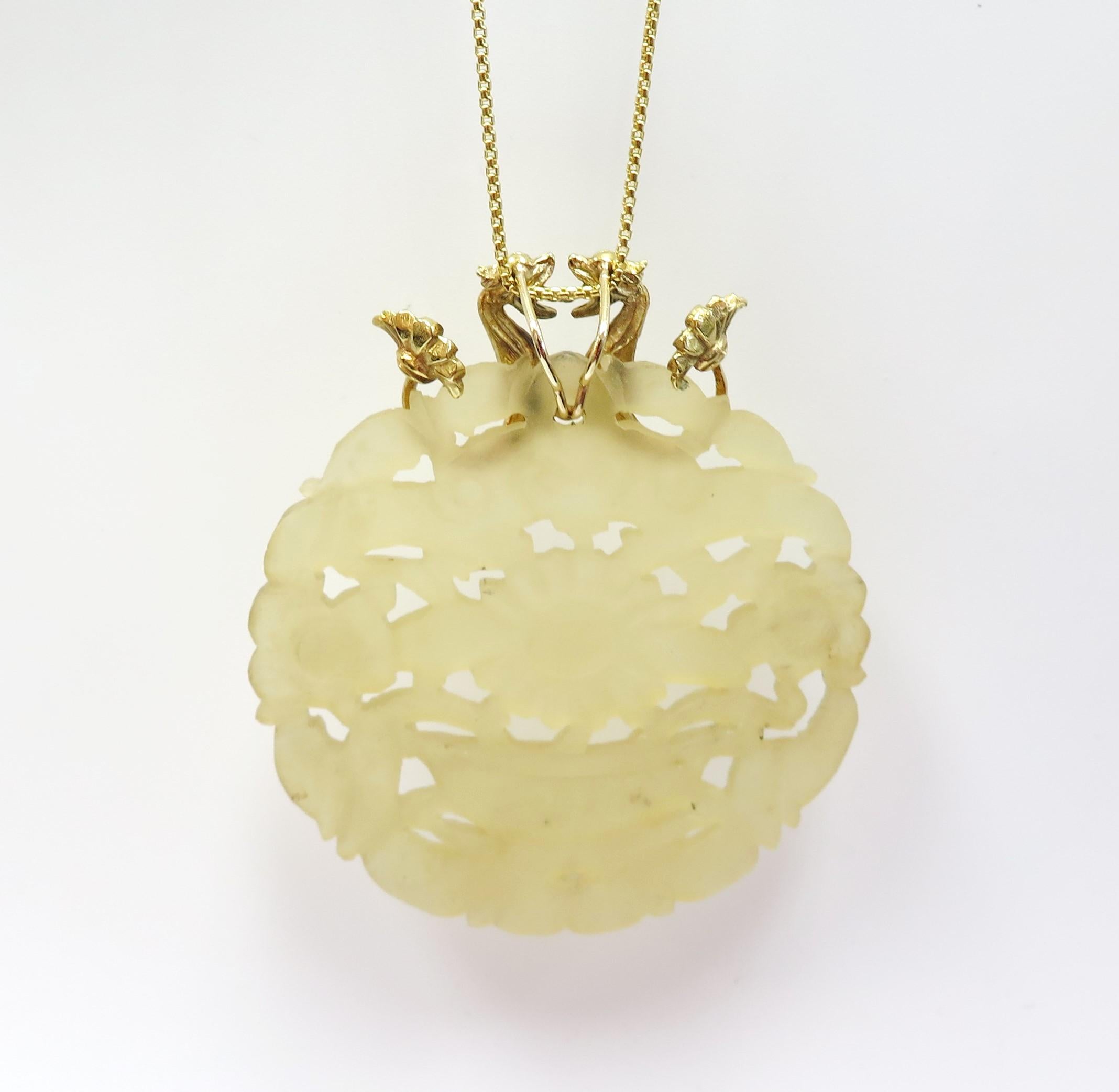 Large Carved Yellow Jade Pendant with Two Dragons and Ruby Bail / 14 Karat In Excellent Condition For Sale In Bellmore, NY
