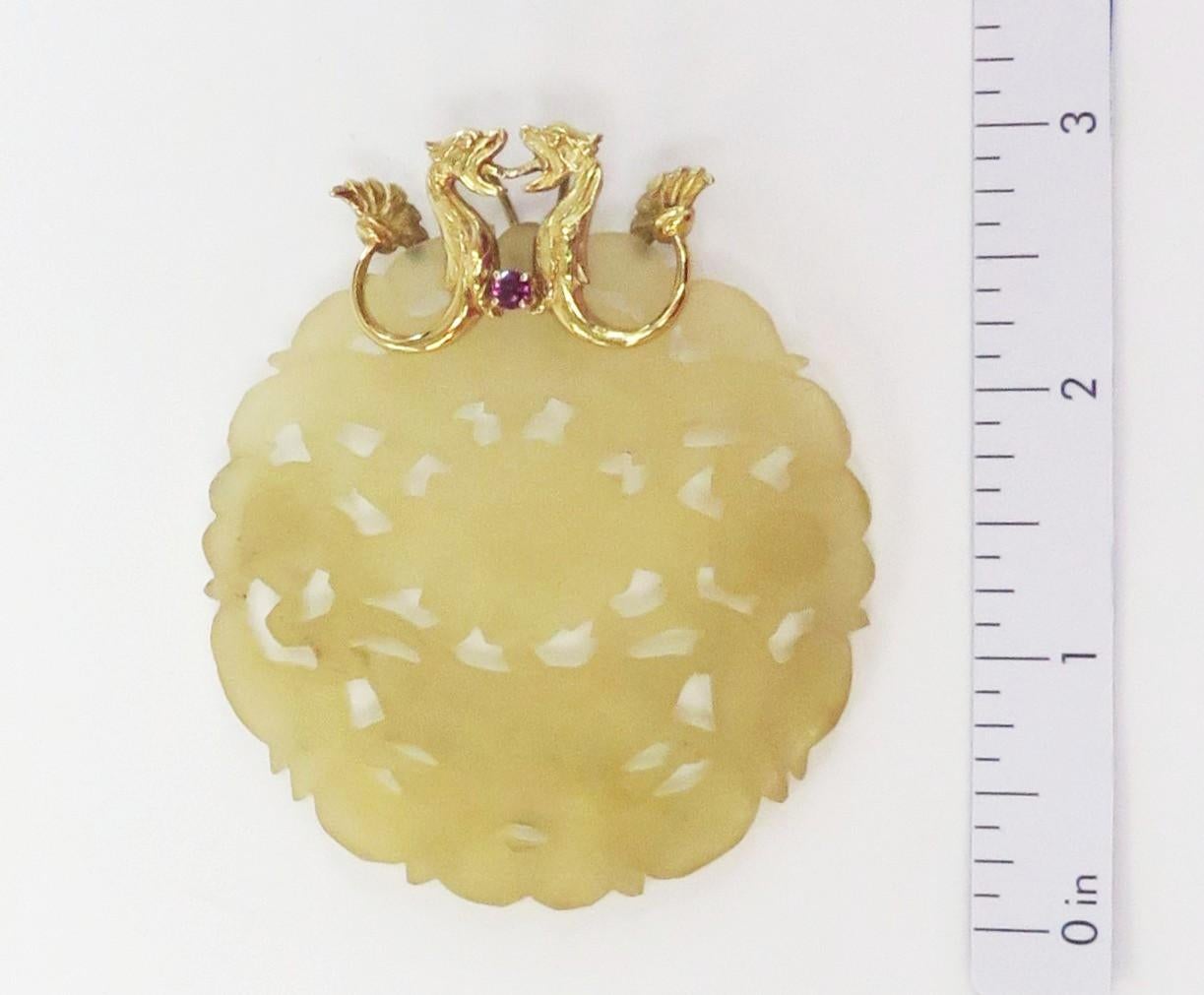 Women's Large Carved Yellow Jade Pendant with Two Dragons and Ruby Bail / 14 Karat For Sale