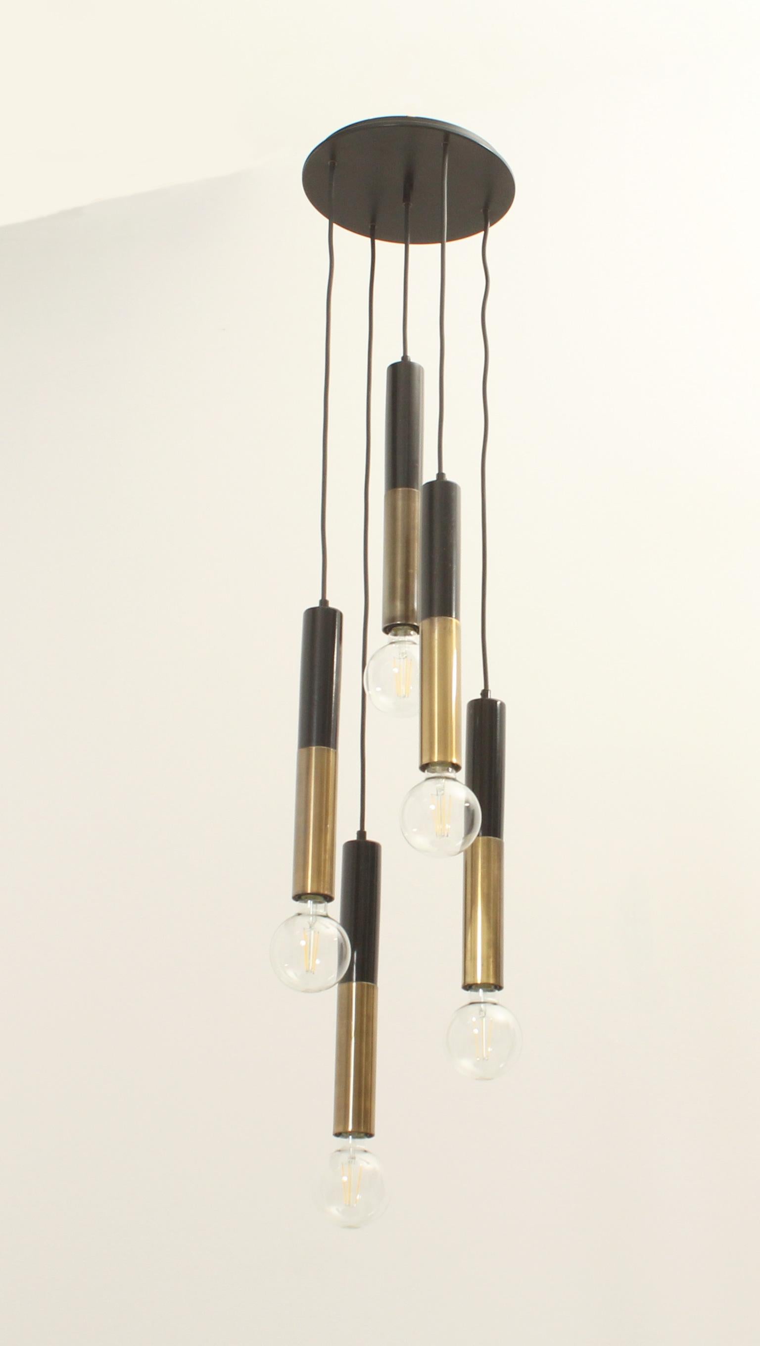 Cascade chandelier with five lights from 1960s, Italy. Brass and black bakelite tubes with five bulbs.