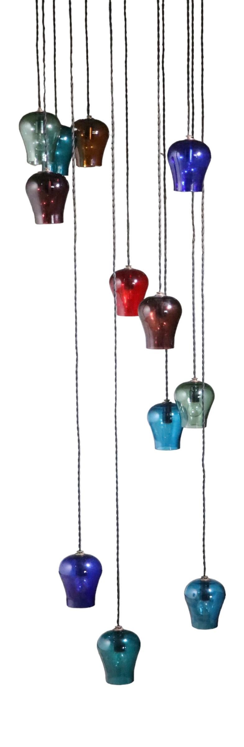  Large Cascading 12 Light  Mid Century Chandelier with Colored Glass Bell Shades For Sale 3