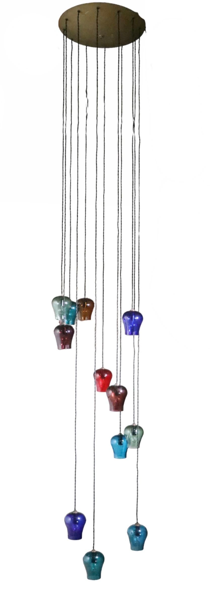  Large Cascading 12 Light  Mid Century Chandelier with Colored Glass Bell Shades For Sale 4
