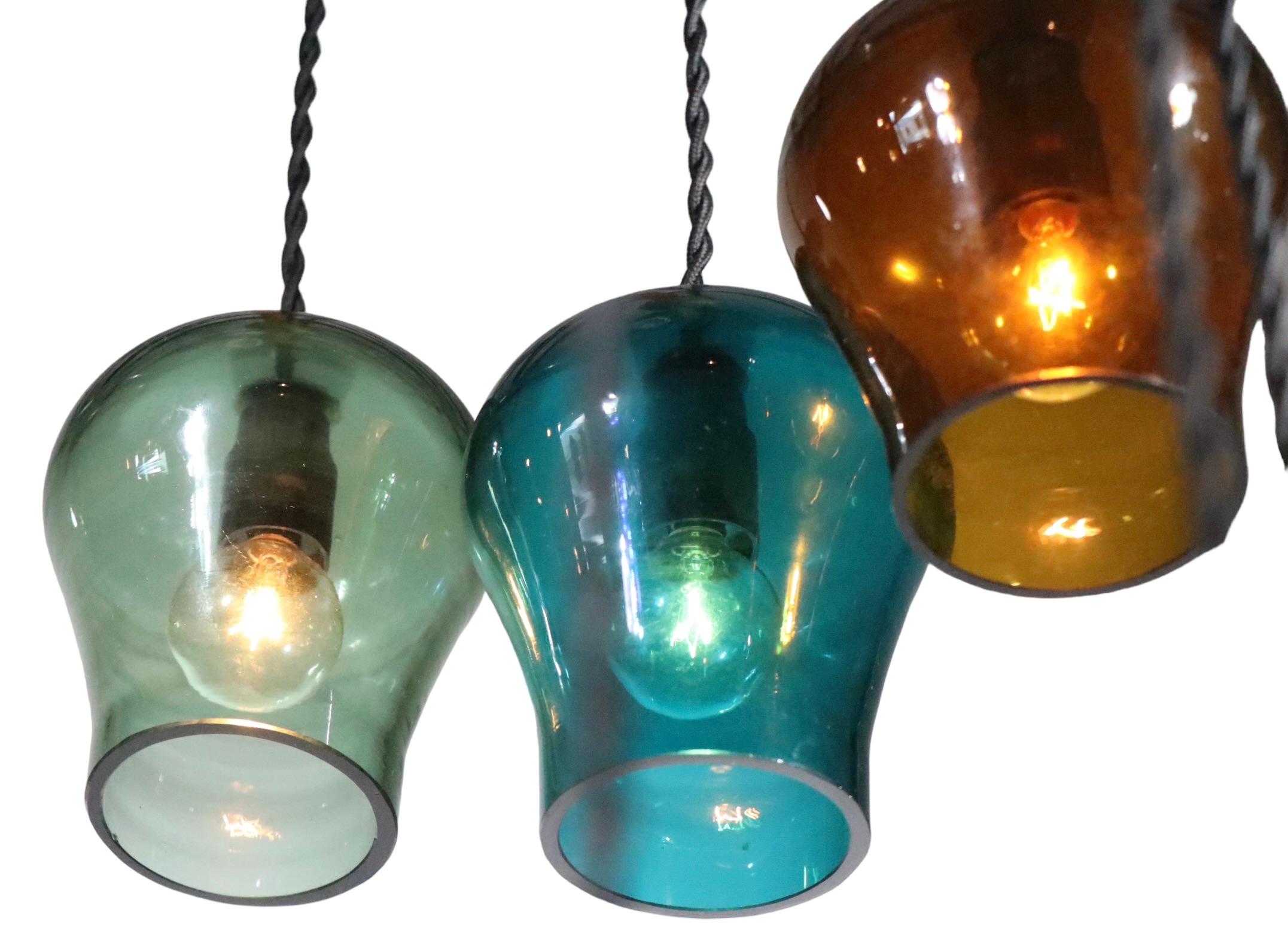  Large Cascading 12 Light  Mid Century Chandelier with Colored Glass Bell Shades For Sale 6