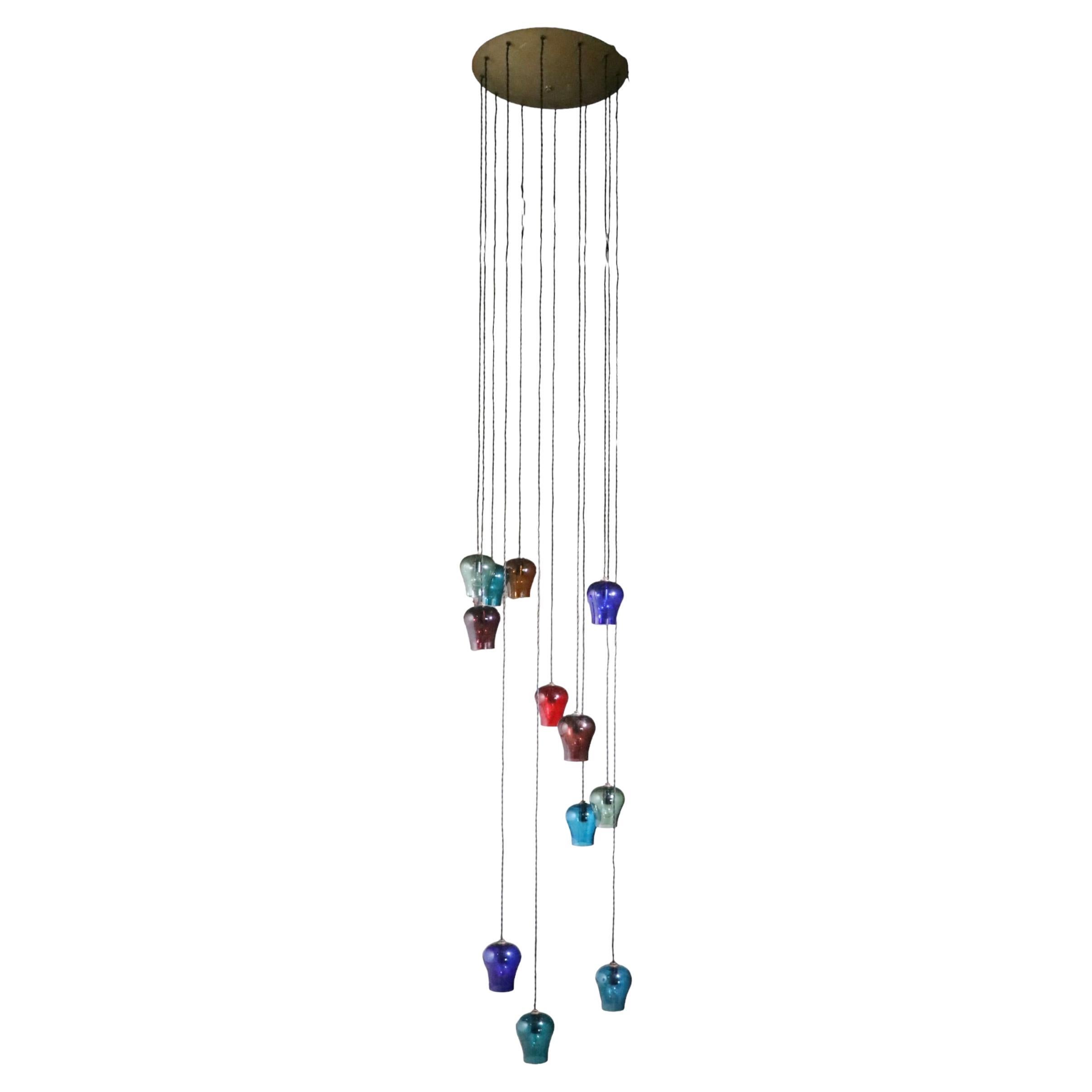  Large Cascading 12 Light  Mid Century Chandelier with Colored Glass Bell Shades For Sale