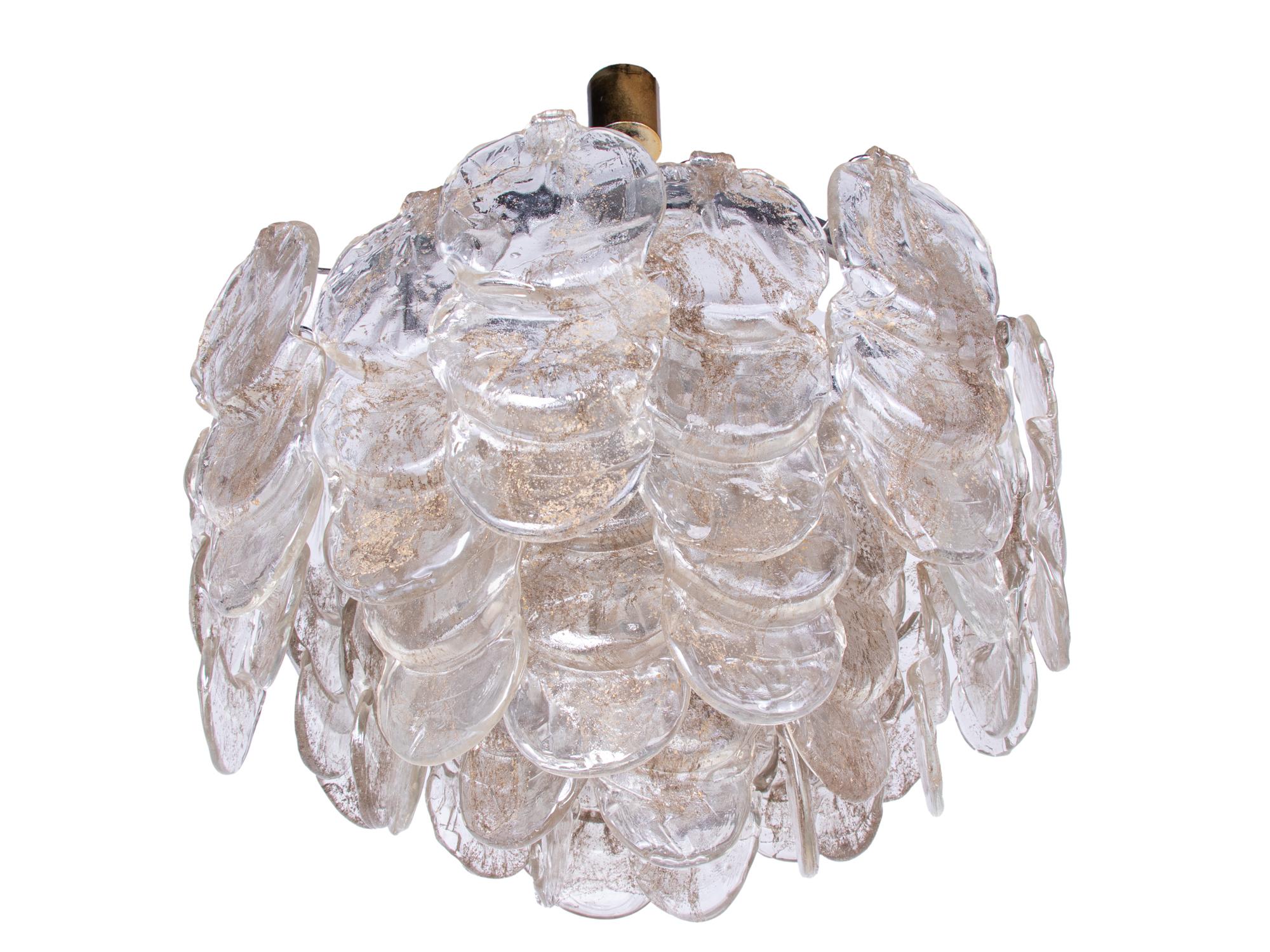 Elegant cascading ceiling light with 36 thick curved amber, smoky and clear textured Murano glass elements on a chromed frame. Heavy duty. Has 6 sockets. In very good condition. Gives beautiful light. Amazing mid century design. Gem from the time.