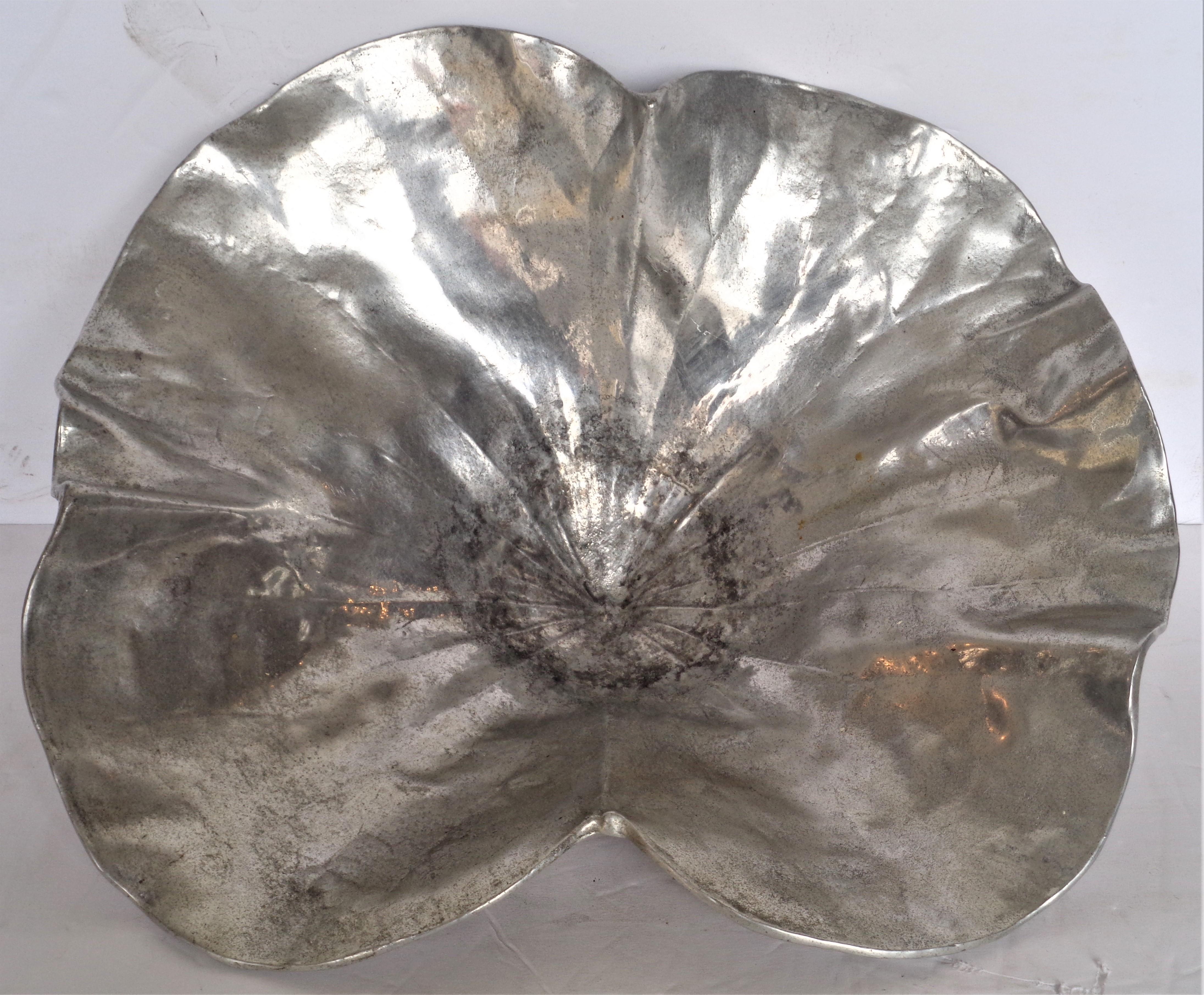 Cast aluminum lotus leaf bowl by Oskar Hansen for Harvin Company. Nicely aged original surface color with some oxidation. Stamped on underside - Lotus Large 3514 Harvin and some other writing that has worn off. Circa 1940's. Look at all pictures and
