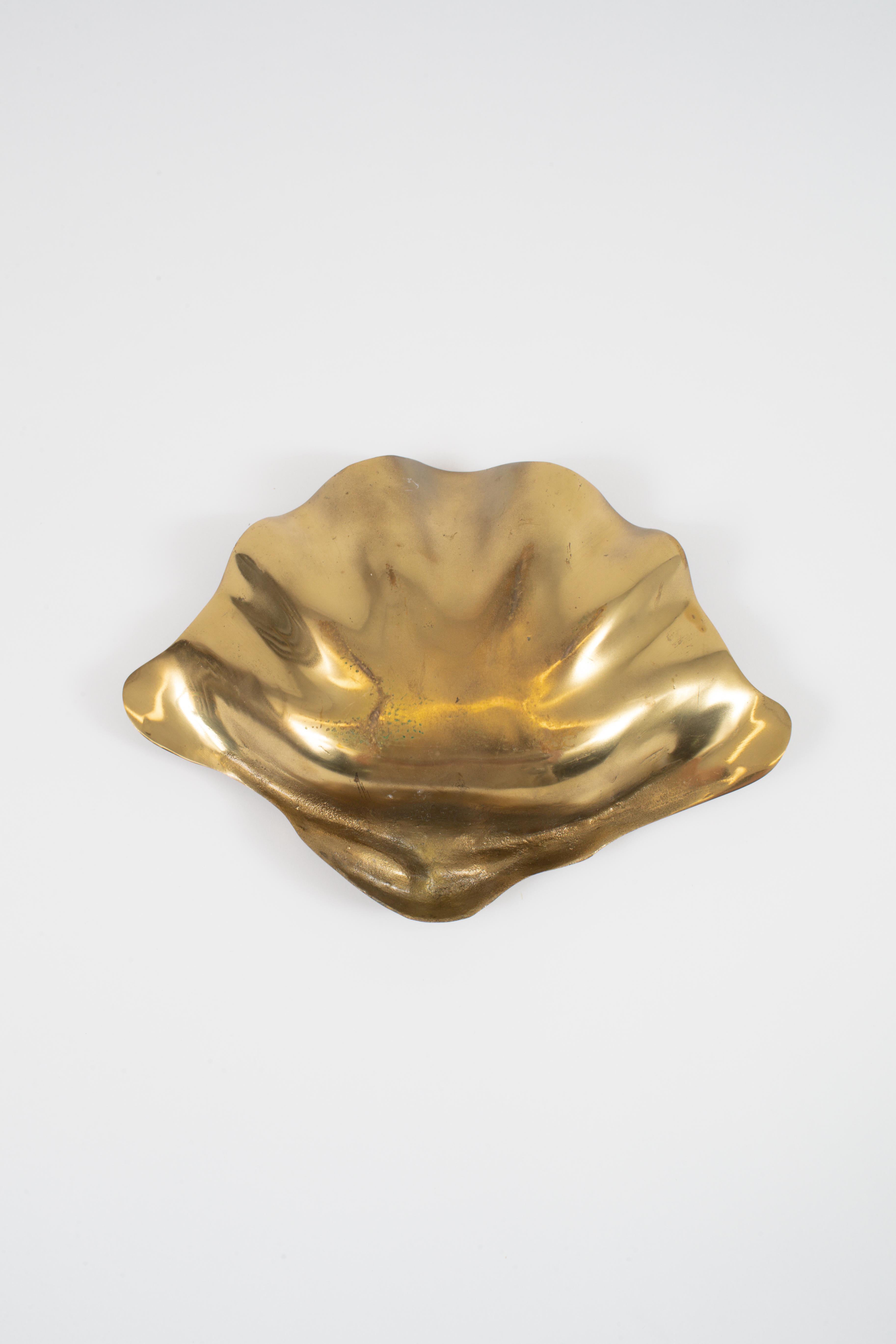 A large Benitier shell in cast brass with original patina.