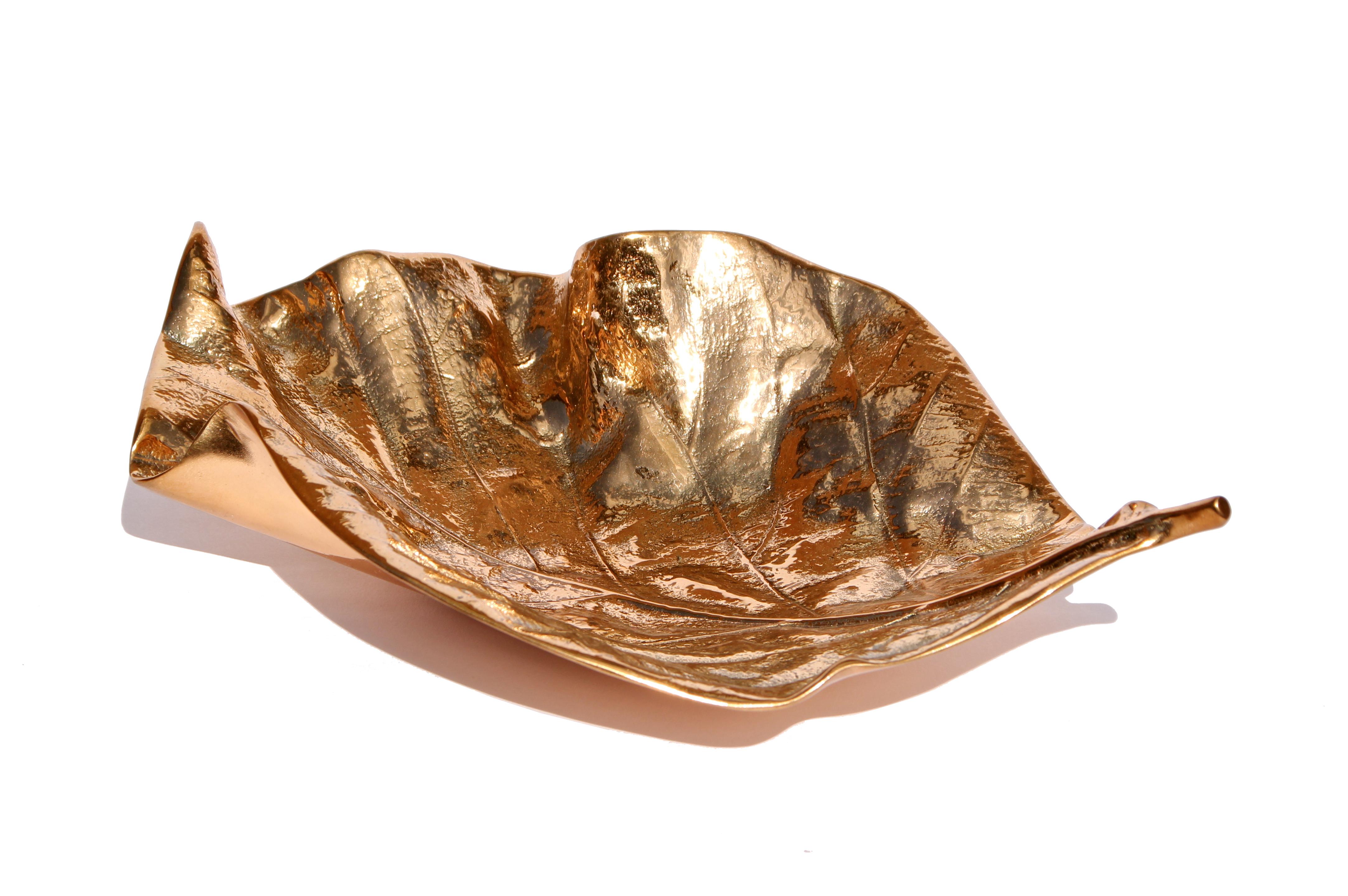 Elegant handmade cast bronze leaf in a polished bronze finish. They may be used as a bowl or just a beautiful decorative object.

Each of these splendid leaves are handmade individually with incredible detail. Cast using very traditional techniques,