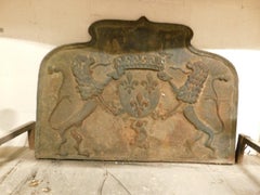 Large cast iron fireplace backplate, carved with noble coat of arms, Italy
