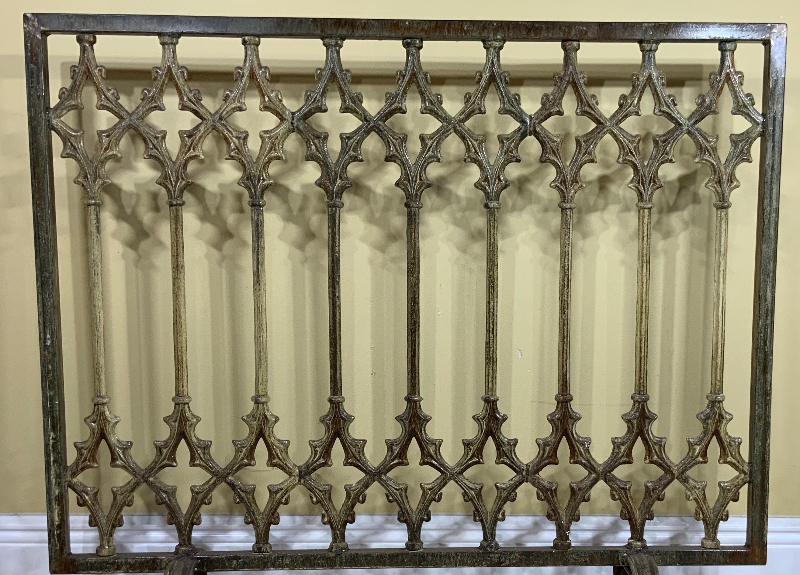 Beautiful fireplace screen made of cast iron with artistic cathedral motifs all around, treated and sealed for rust, could use two sides. Great object of art for display.