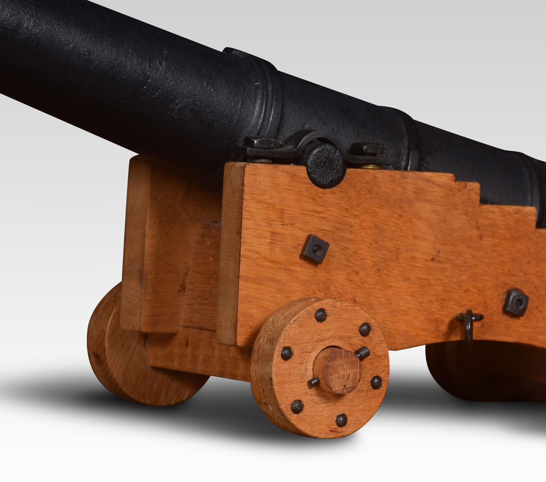 Cast iron signal cannon having 15.5 inch barrel on later oak carriage with working wheels.
Dimensions:
Height 8.5 inches
Length 15.5 inches
width 7 inches.