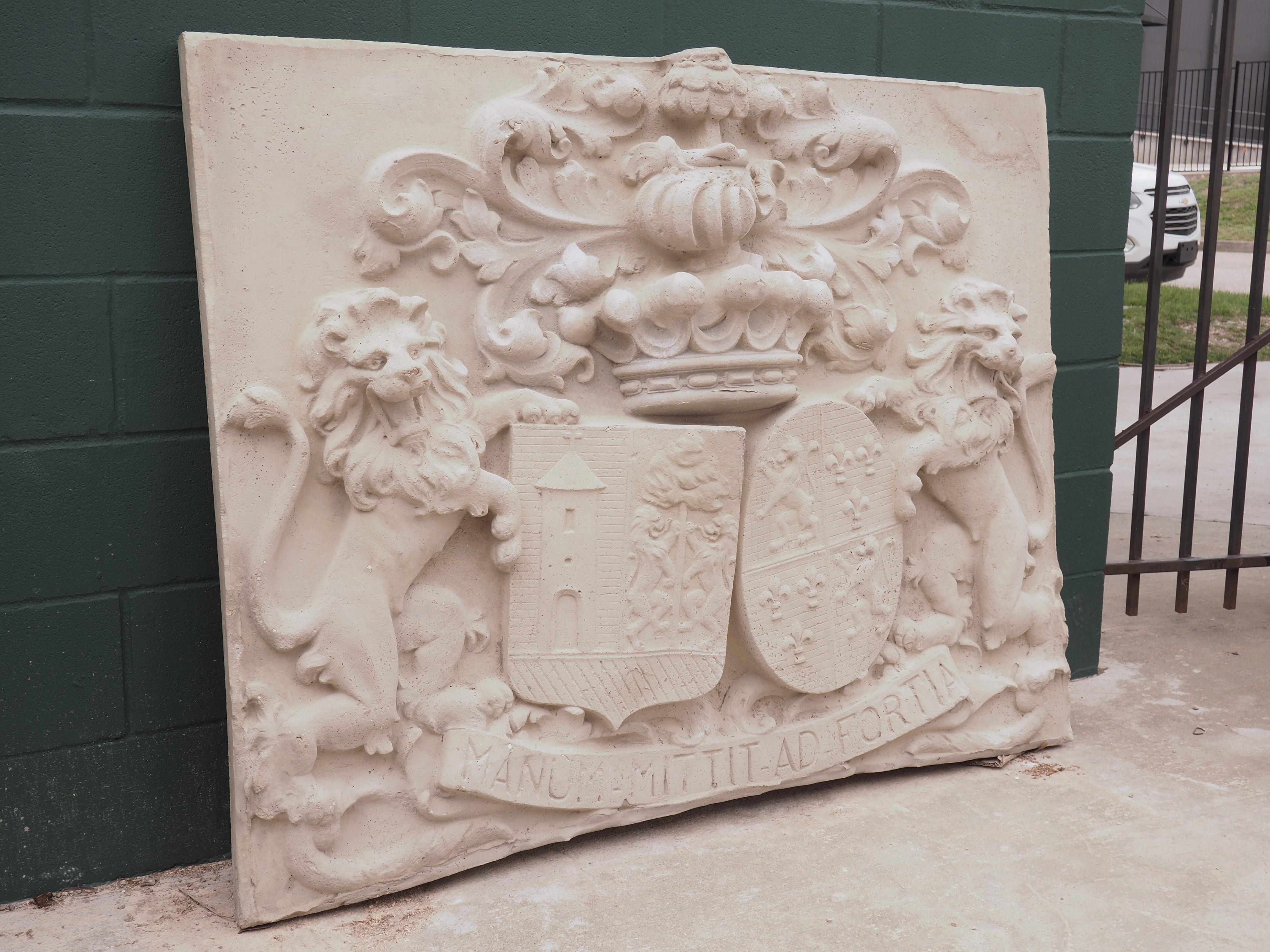 After a stone panel that once graced the front of a Belgian castle, this large cast stone plaque features an intricate coat of arms, quite possibly from the Crawhez family. The heraldic display was referenced in 1861 by Jean-Baptiste Rietstap, a