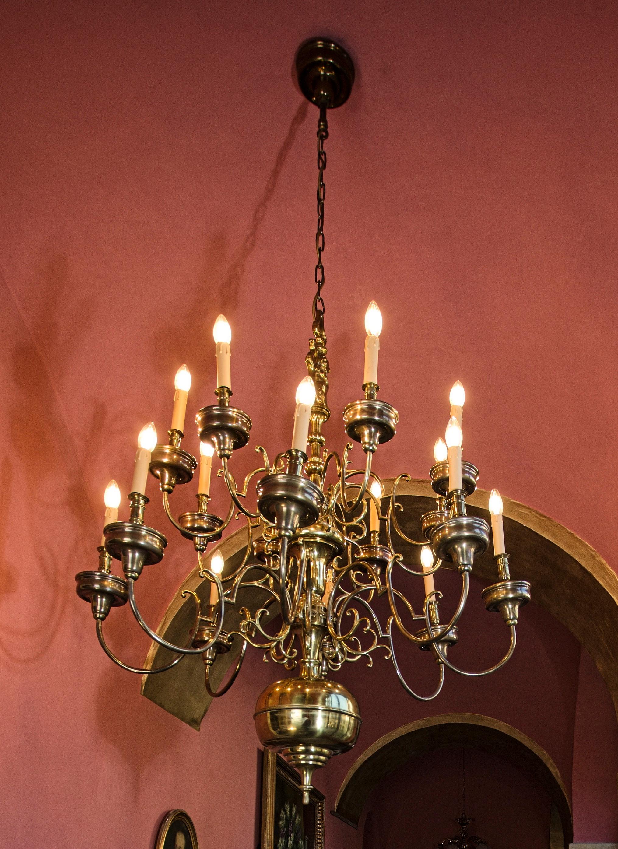 Large castle chandelier with a mermaid, 16 arms

A large Dutch style polished brass chandelier with a mermaid. Sixteen-arm design in two floors. Condition: the chandelier is after renovation of the electrical installation: new supply cable, new