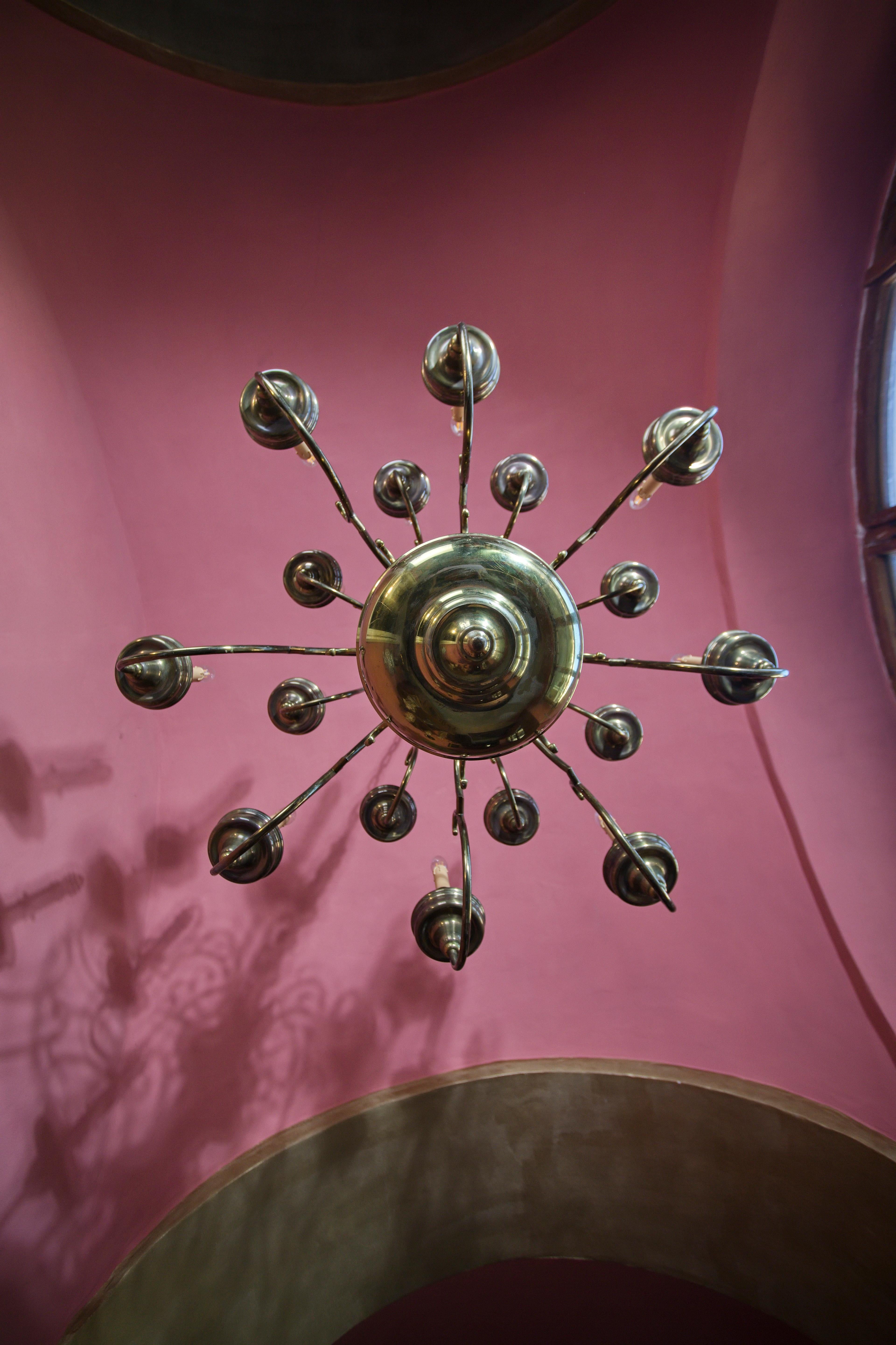 Polished Large castle chandelier with a mermaid, 16 arms For Sale