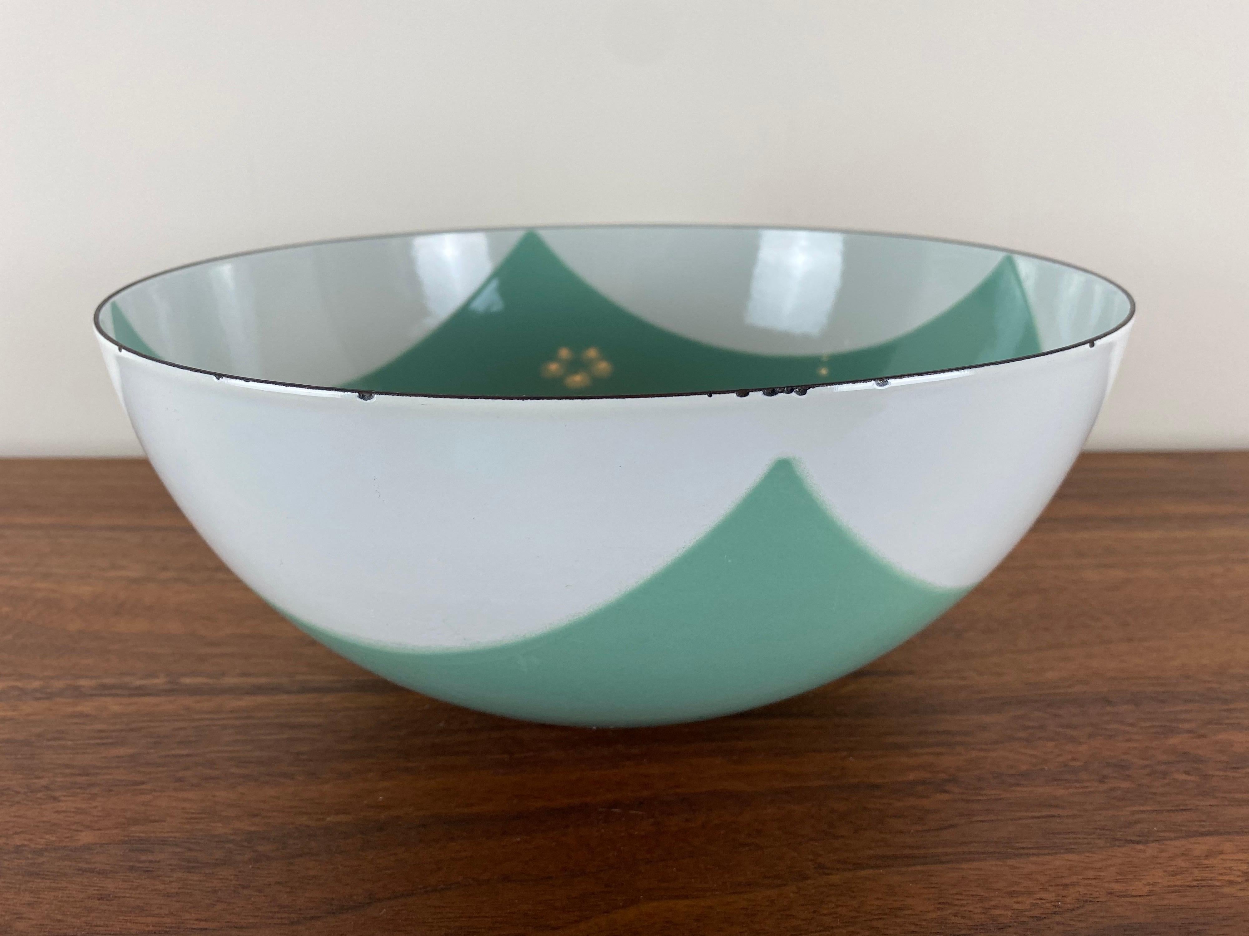 This is the largest of the Catherineholm collection flag bowls. This example is a rare seafoam green and white enamel.