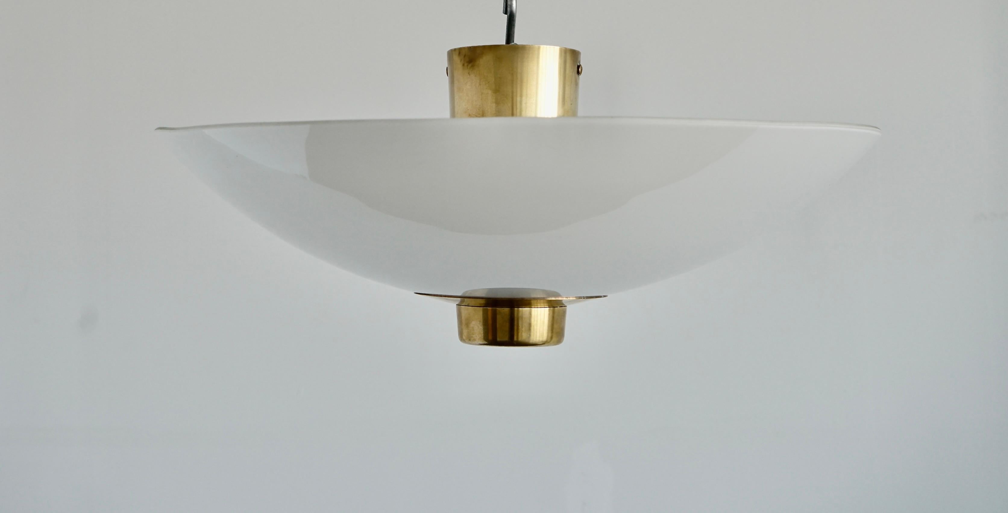 Large flush mount ceiling lights designed by Paavo Tynell for Idman.
 