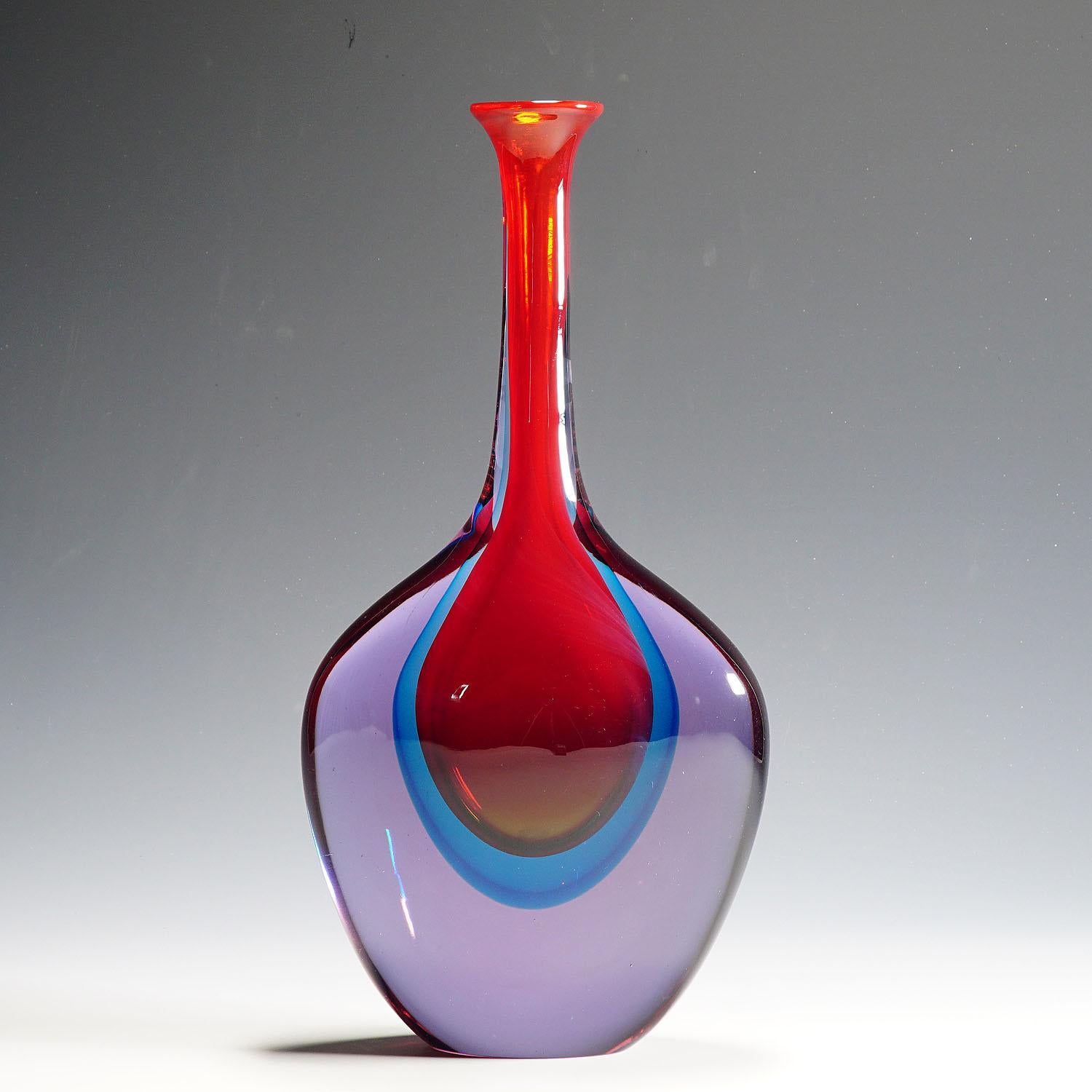 A large and heavy sommerso glass vase manufactured by Ars Cenedese and designed by Antonio Da Ros, Murano. Red and blue sommerso glass with a violett overlay. Incised signature 