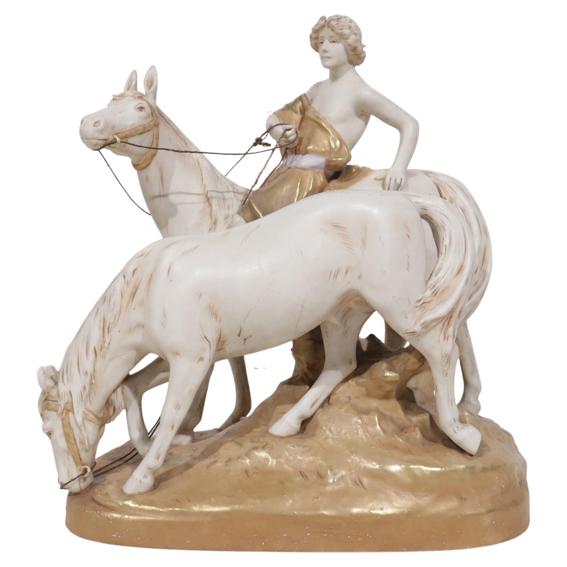 Grand groupe d'antiquités de centre de table Royal Dux représentant un garçon chevauchant deux chevaux