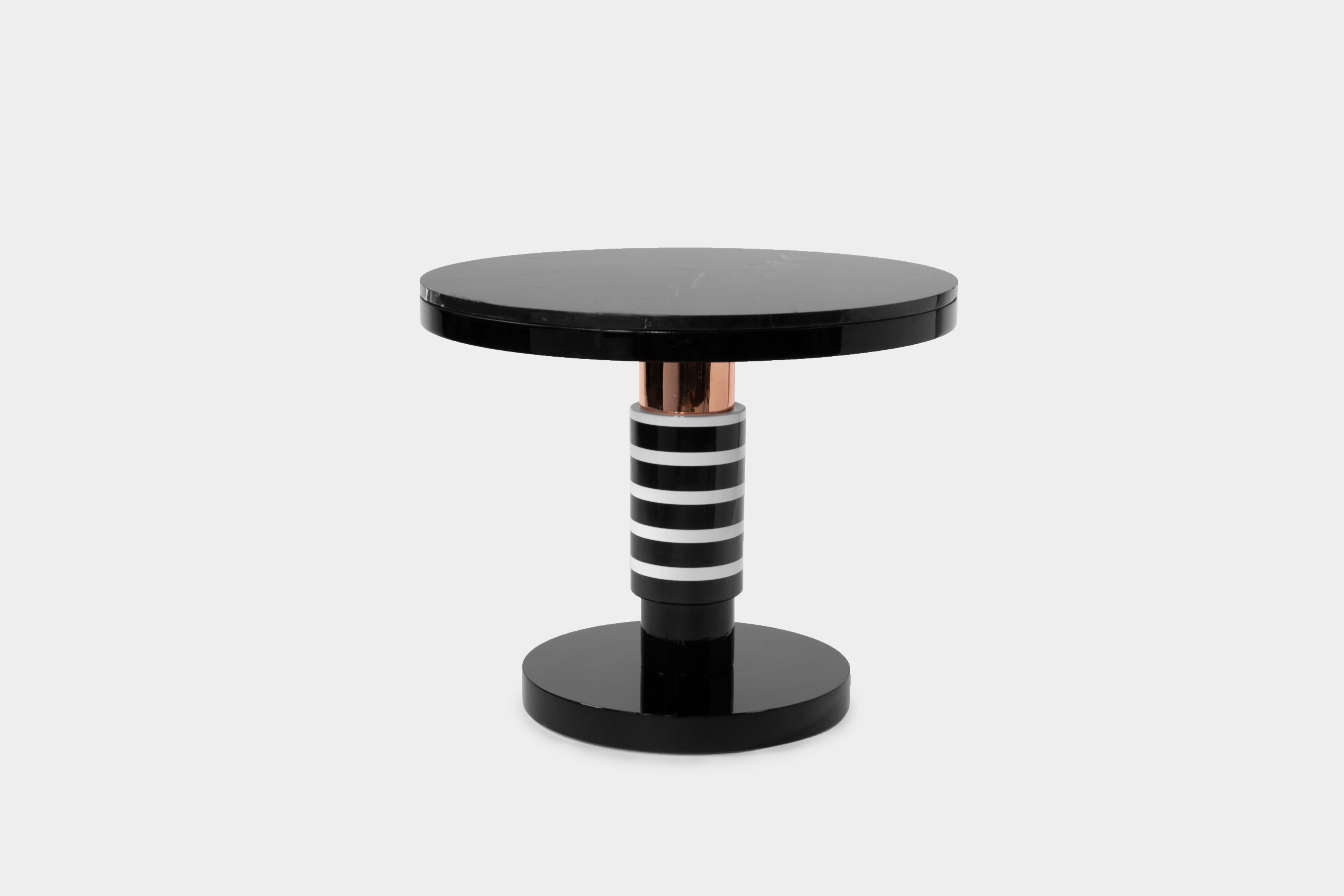 Large ceramic and marble coffee table by Eric Willemart

Materials: Handcrafted ceramic glazed in black and white and copper finishes
Base: glazed ceramic on an aluminium plate
Top: polished Nero Marquina marble, plate embedded in a