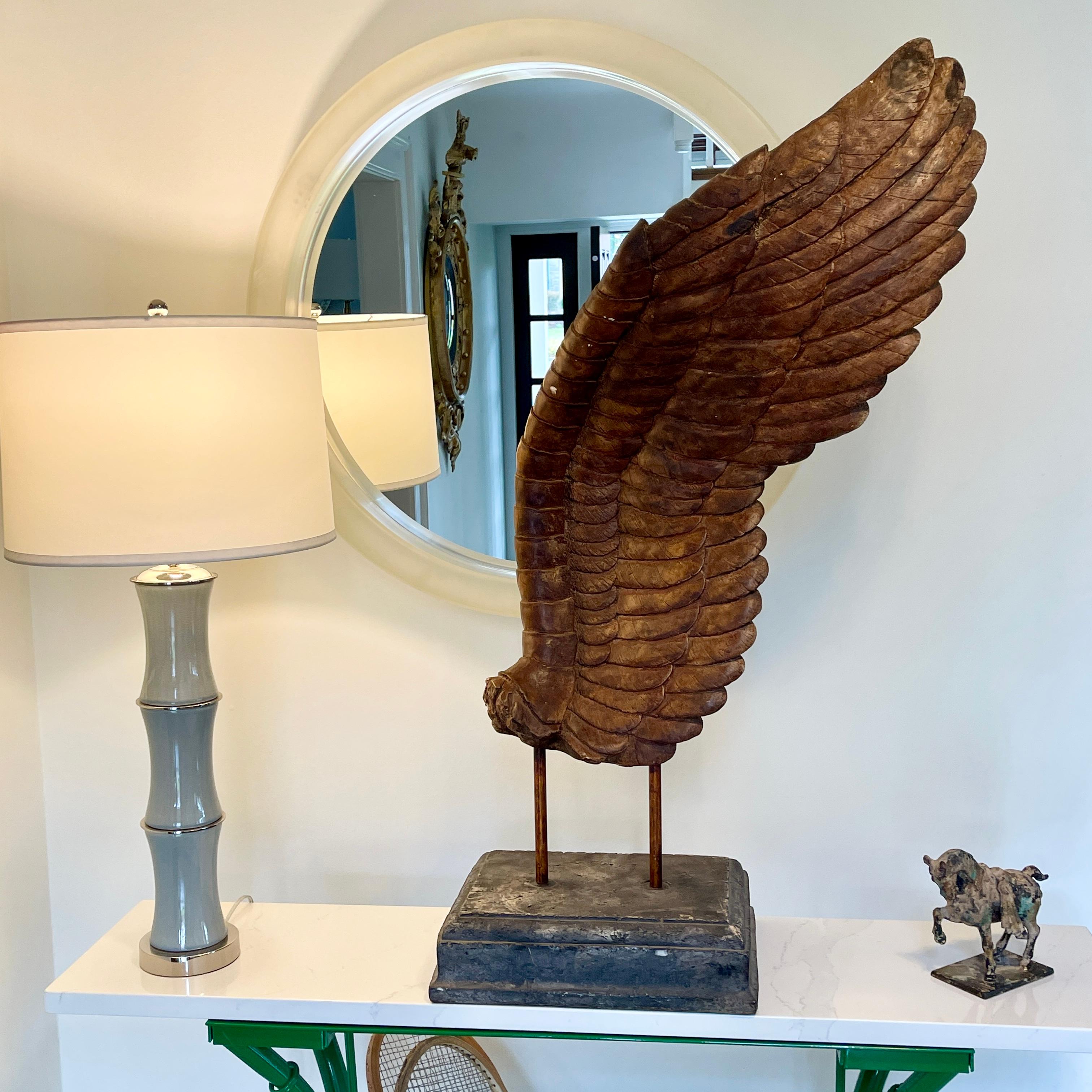 Signed Ceramic Angel Winged Sculpture on Concrete Base
Tall and impressive distressed sculpture constructed and sculpted from heavy ceramic material. The base is solid concrete. Rather unique and certainly a statement piece in any home or office