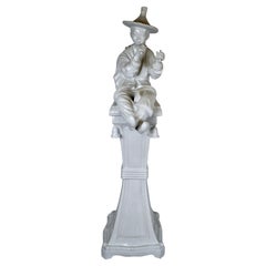 Large Ceramic Blanc de Chine Figure of a Chinese Musician on Pedestal