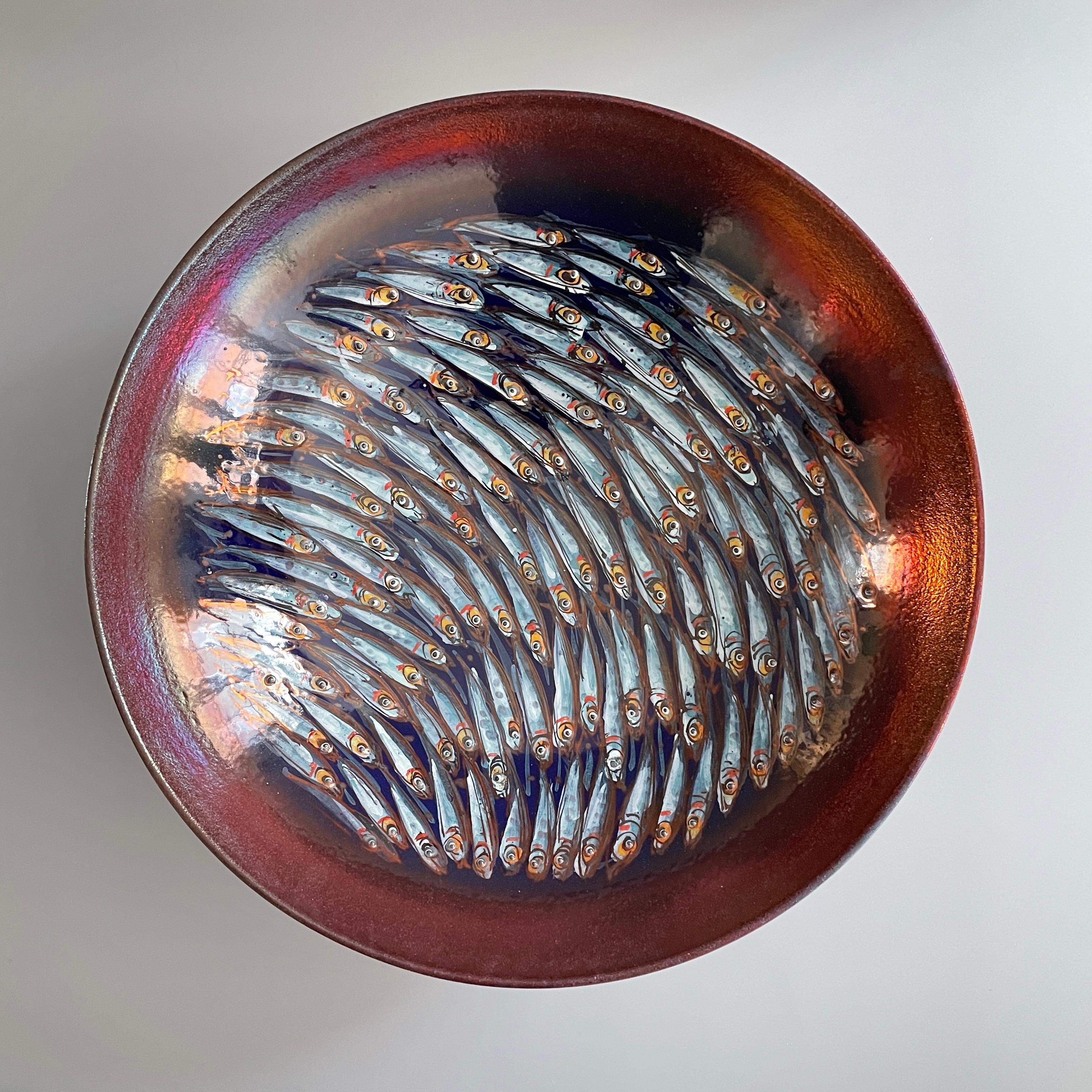 Mediterranea large bowl, 2020, full-fire reduction faience earthenware with copper lustre 30 cm diameter 10cm height, hand painted unique piece.

Bottega Vignoli is a brand of artistic ceramics based in Faenza, one of the most representative