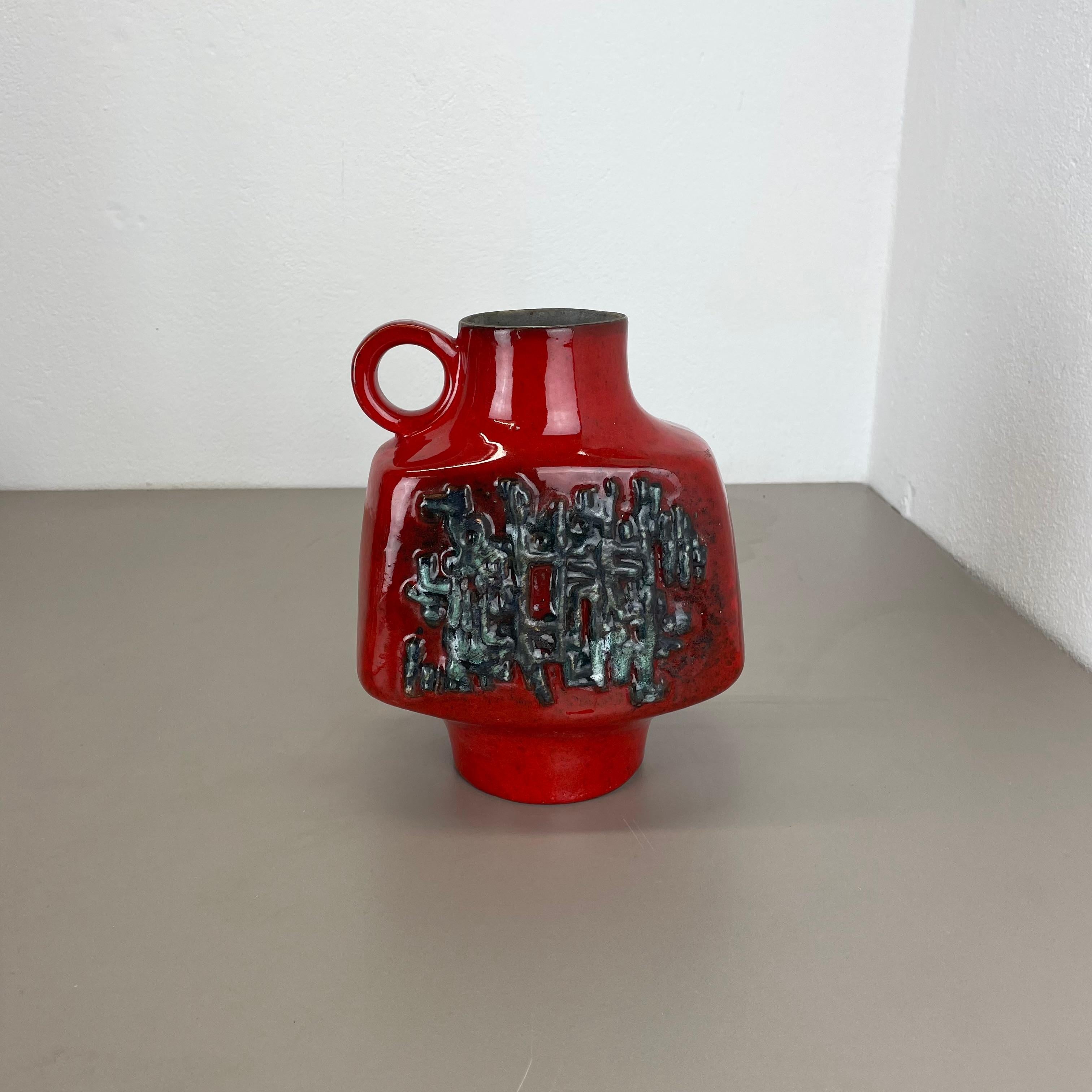 Article:

ceramic pottery vase.


Origin:

Germany.

Producer:

Walter Gerhards, Germany.


Decade:

1970s.


This original vintage pottery object was designed and produced by WALTER GERHARDS in the 1970s in Germany. It is made of pottery ceramic