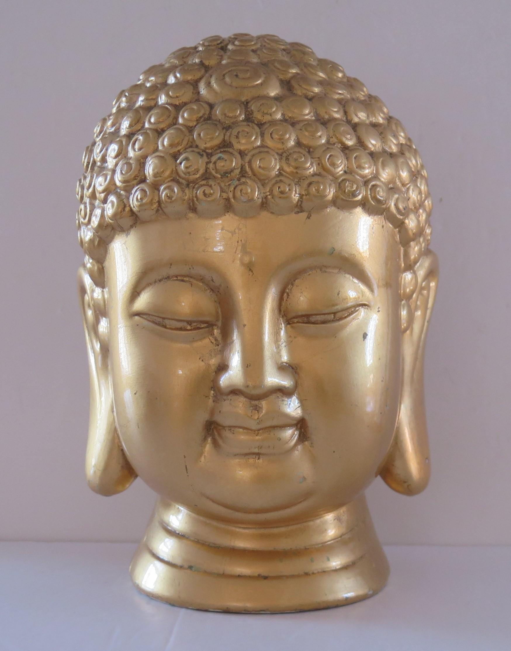 This is a very good large head or bust statue or sculpture of Buddha, possibly Chinese or Japanese, which we date to the first half of the 20th century, circa 1920s.

The large head is well formed with good detail, with the entire head (apart from