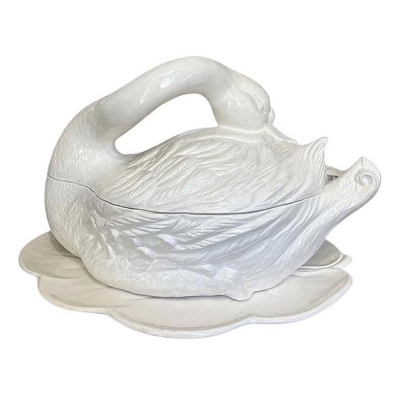 Your next dinner party just got interesting. This large vintage ceramic swan tureen is just what your table has been asking for. Created from ceramic, this piece is shaped like a swan. The top consists of the bird's long white neck which is