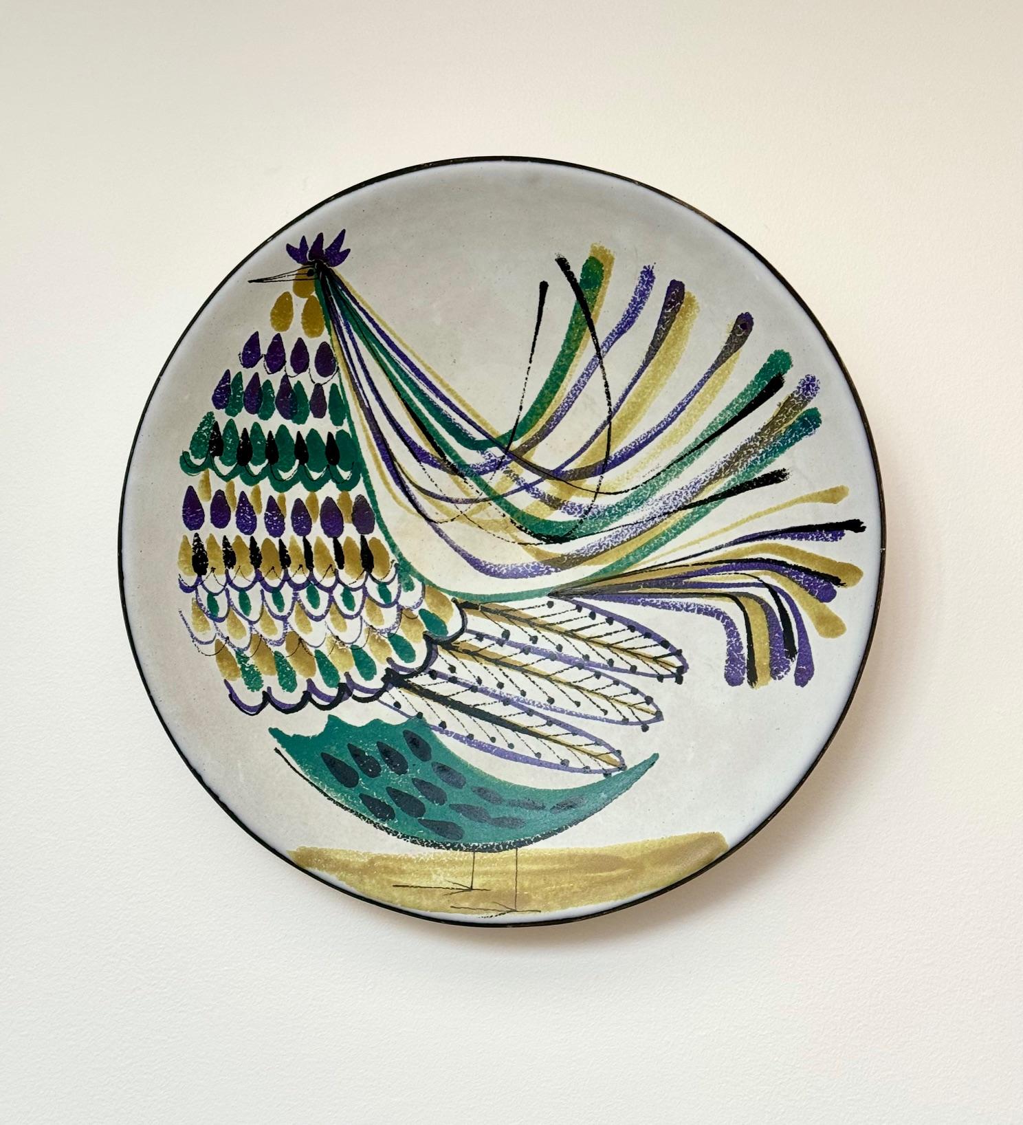 Roger Capron (1922-2006)
Roger Capron studied at Art appliqués of Paris from 1938 to 1943 before teaching drawing in the same establishment from 1945. In 1946, he settled in Vallauris where he created a ceramic workshop.

Large dish, faience tin