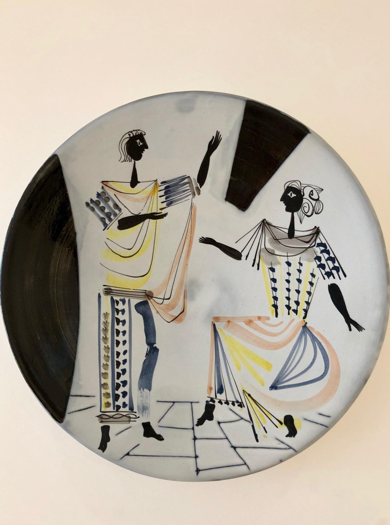 Roger Capron (1922-2006)
Large plate, faience tin glaze, paraffin reserve and polychrome decoration with ancient figures, 1955
Measures: Diameter 39 cm. Signed Capron Vallauris.