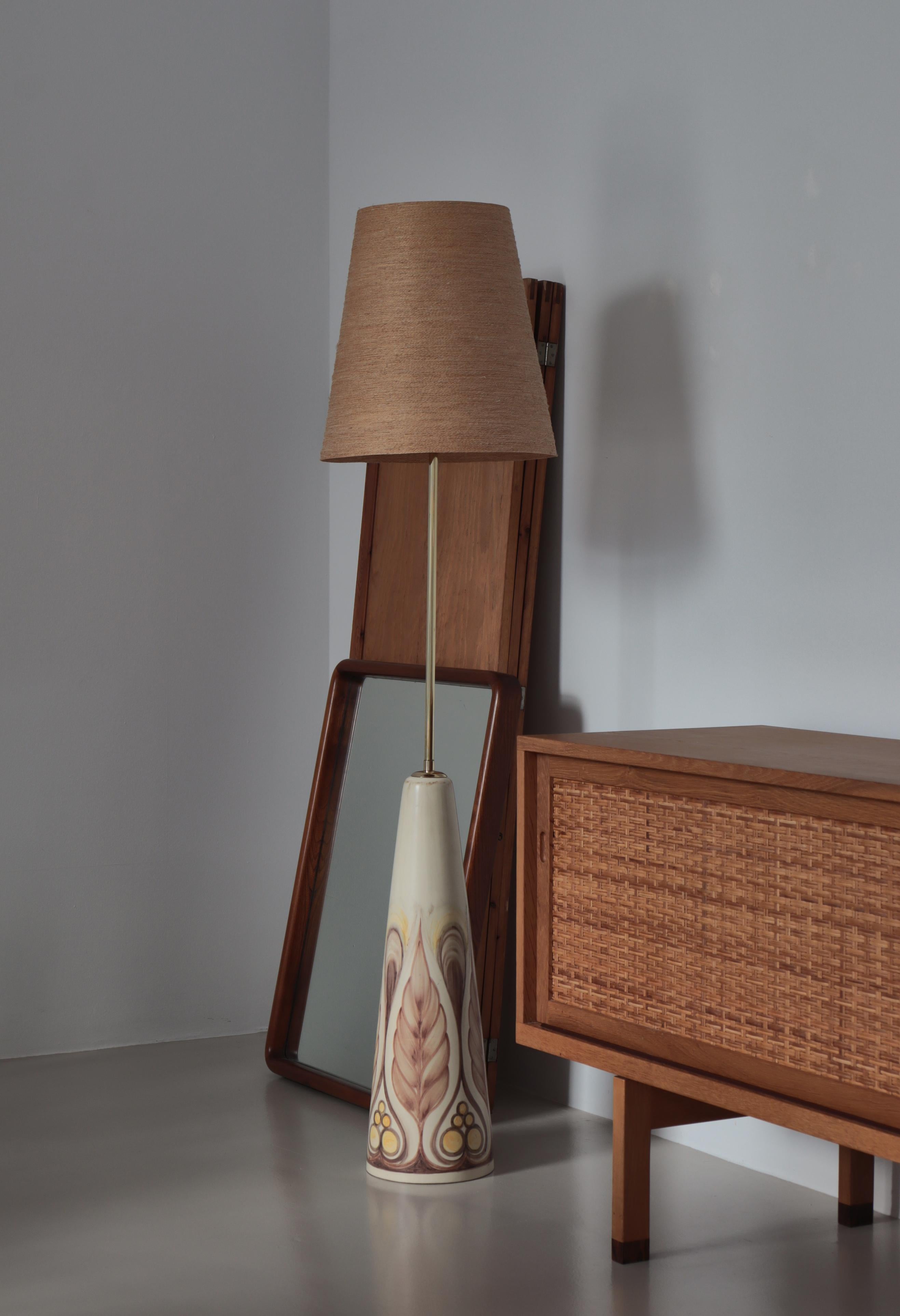 Stunning hand painted floor lamp from the 1960s by Danish artist Rigmor Nielsen at Søholm ceramics workshop, Bornholm. The floral pattern in shades of brown on this lamp is simply amazing and are only found on this unique example. Each of these rare