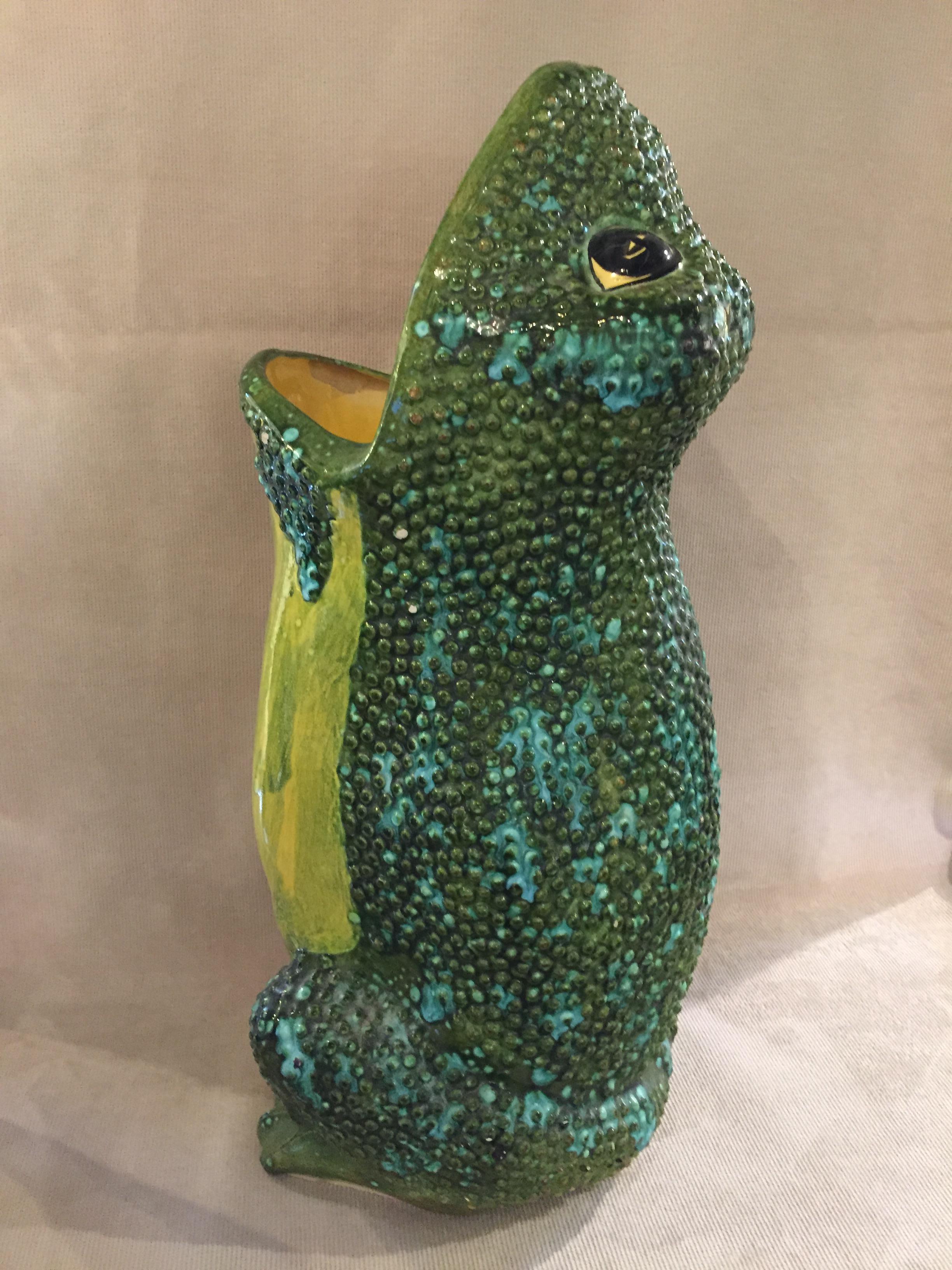 Large ceramic frog umbrella stand, hand glazed with green yellow Turquoise, stamped Spectrom on side. These where sometimes sold by Gumps Co., this has the old felt covering the bottom.