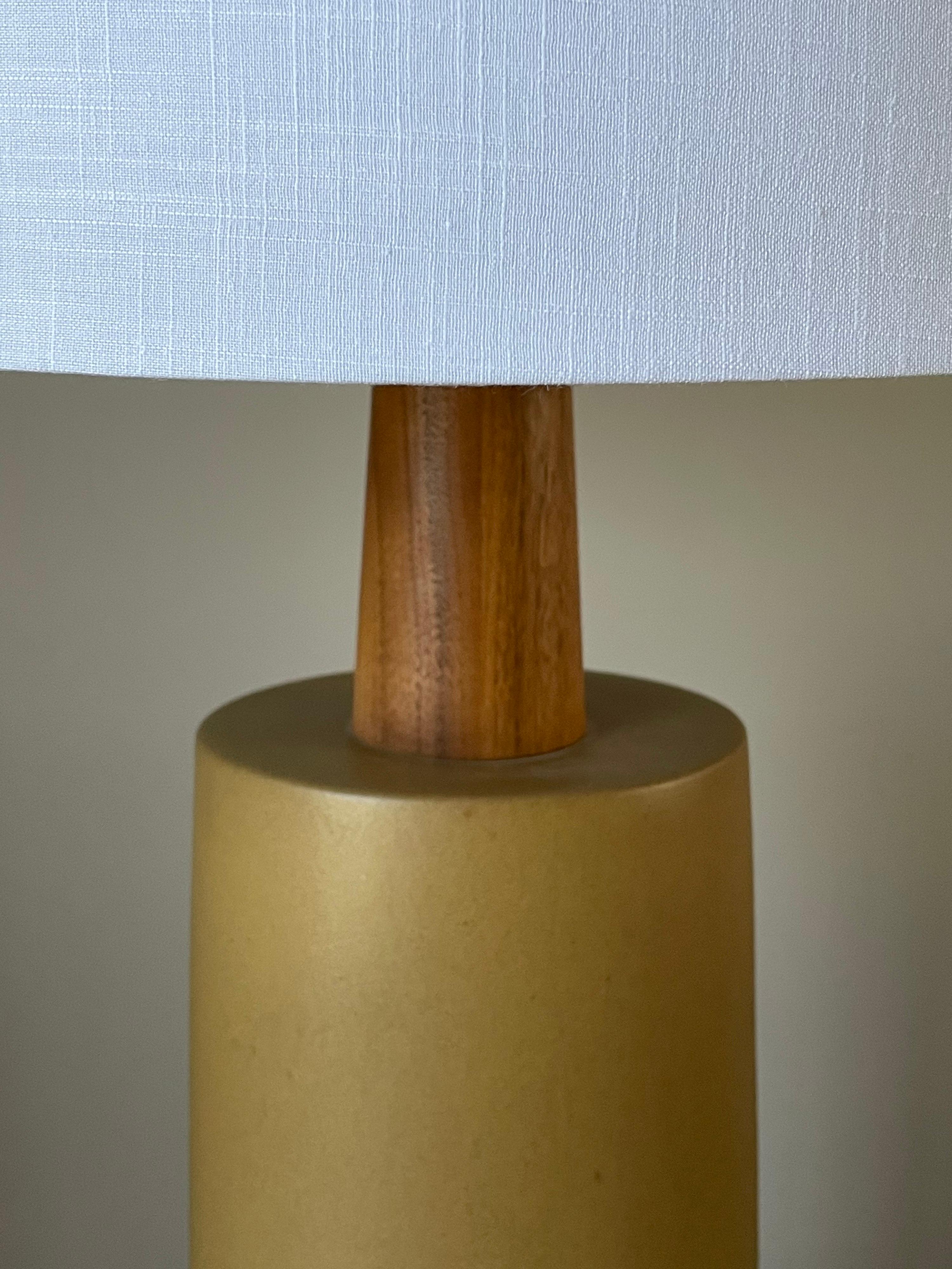 Very large Martz lamp by ceramicist duo Jane and Gordon Martz for Marshall Studios. Beautiful yellow/ ochre matte glaze.

Measures: Overall
34.5” tall
17” wide

Ceramic portion
19” tall
 7” wide.