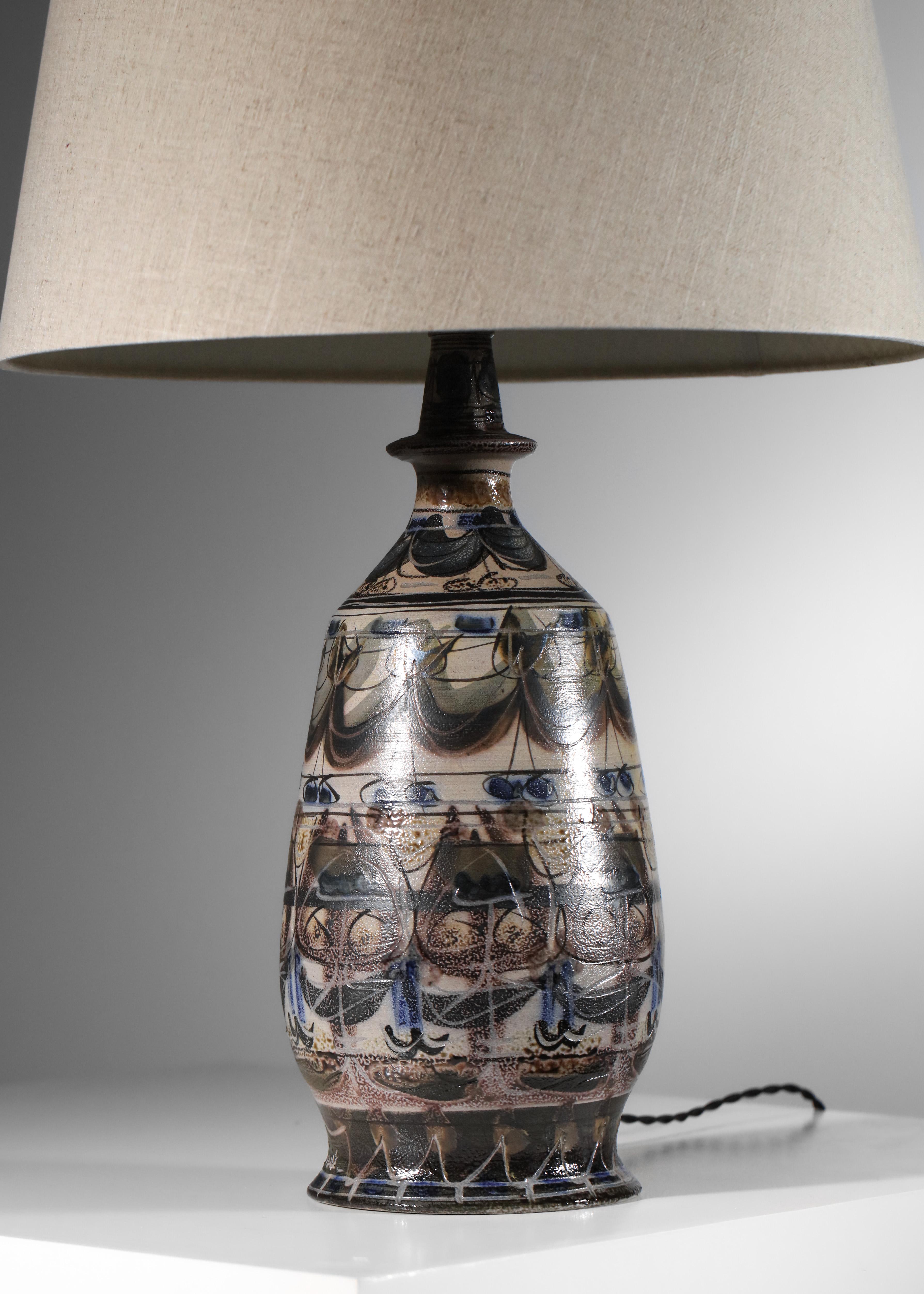 Large 60's table lamp base by French artist Lucas Antoine from the Keraluc factory in Brittany. Ceramic lamp base entirely covered with plant-inspired motifs. Very fine craftsmanship. Presence of the artist's signature on the lamp and the