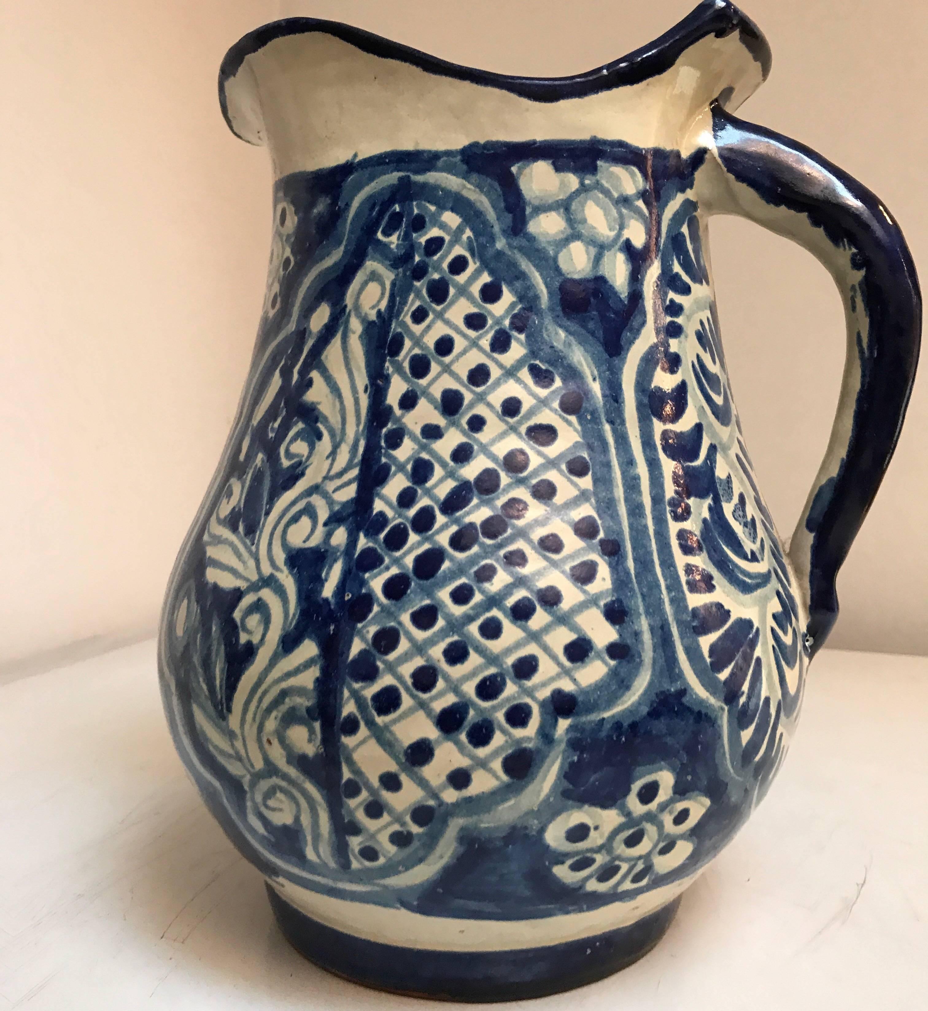 Large scale beautifully decorated Mexican Talavera ceramic blue and white pitcher.
Great for al fresco summertime dining.