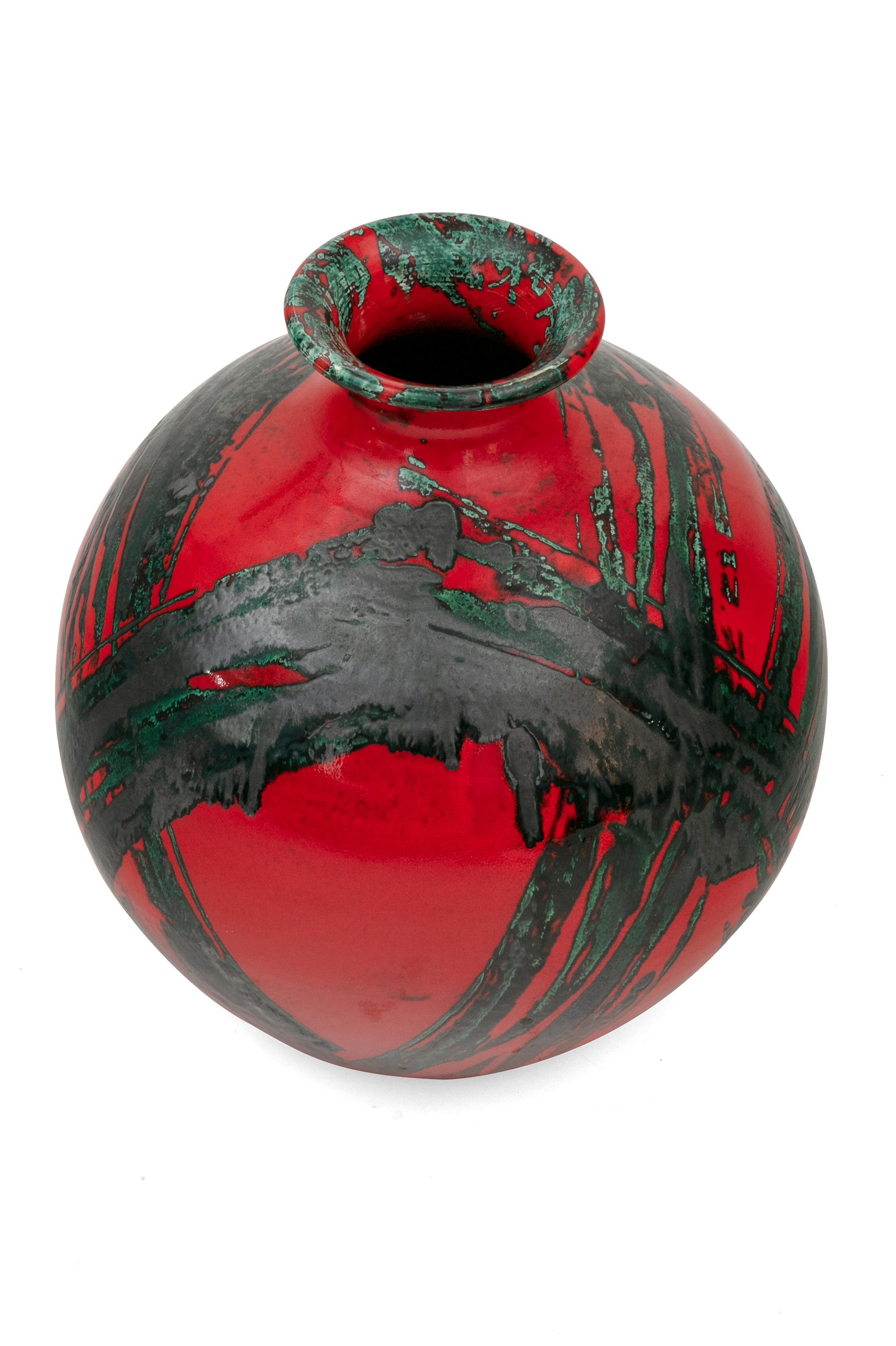 A striking piece of Italian art pottery with a vibrant decoration.