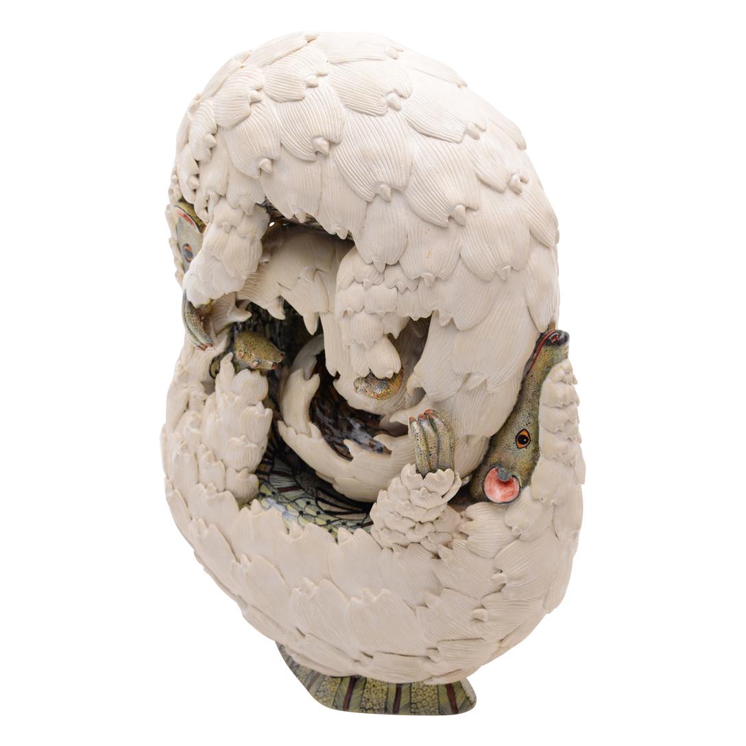 The Ardmore Ceramics Pangolin Circular Sculpture, designed in 2021, is a stunning tribute to South Africa’s revered pangolin, symbolizing resilience and rarity. Crafted by the talented sculptor Thulani Mntungwa and intricately painted by Zinhle