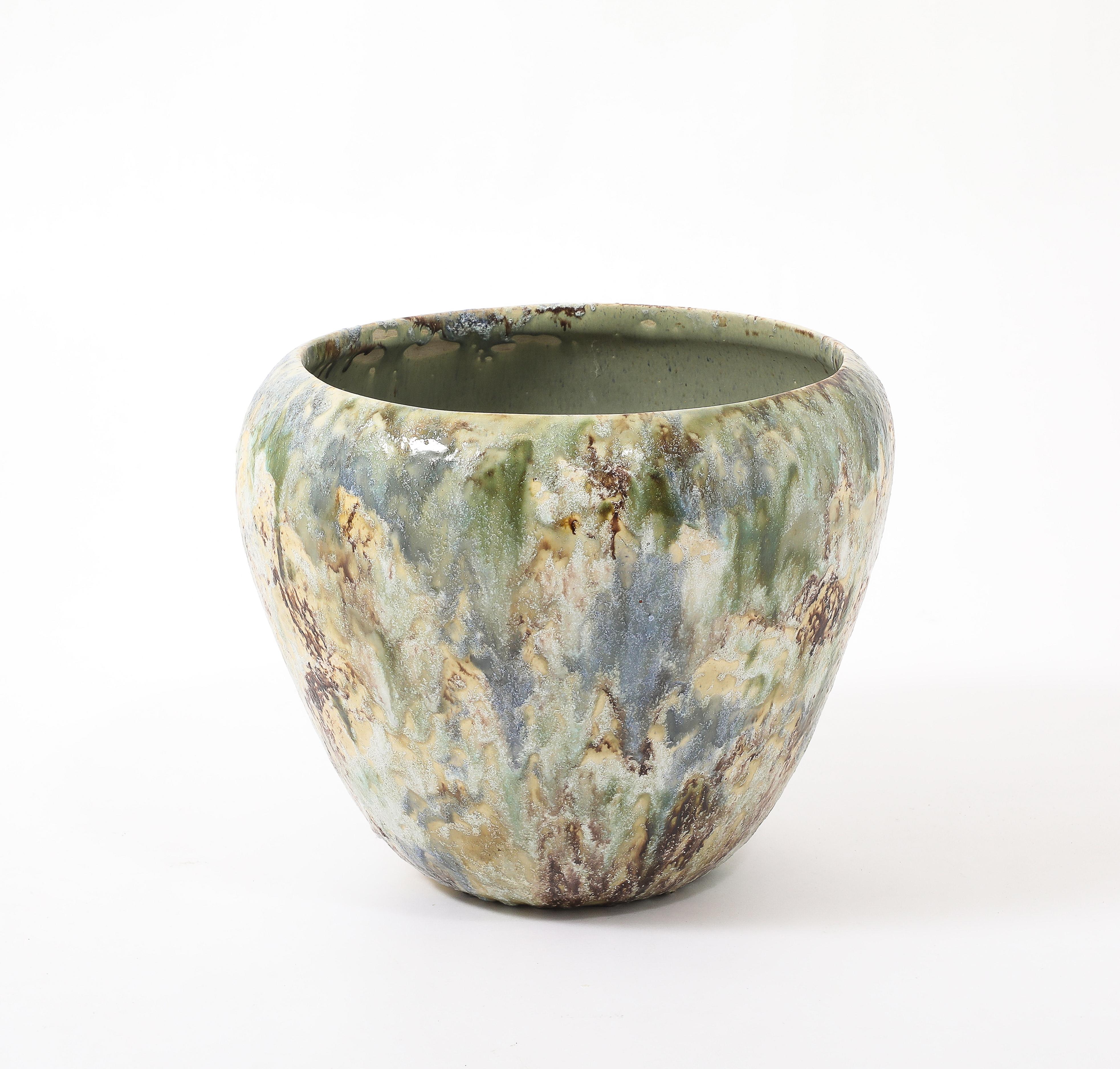 Large studio planter with a multicolored glaze.