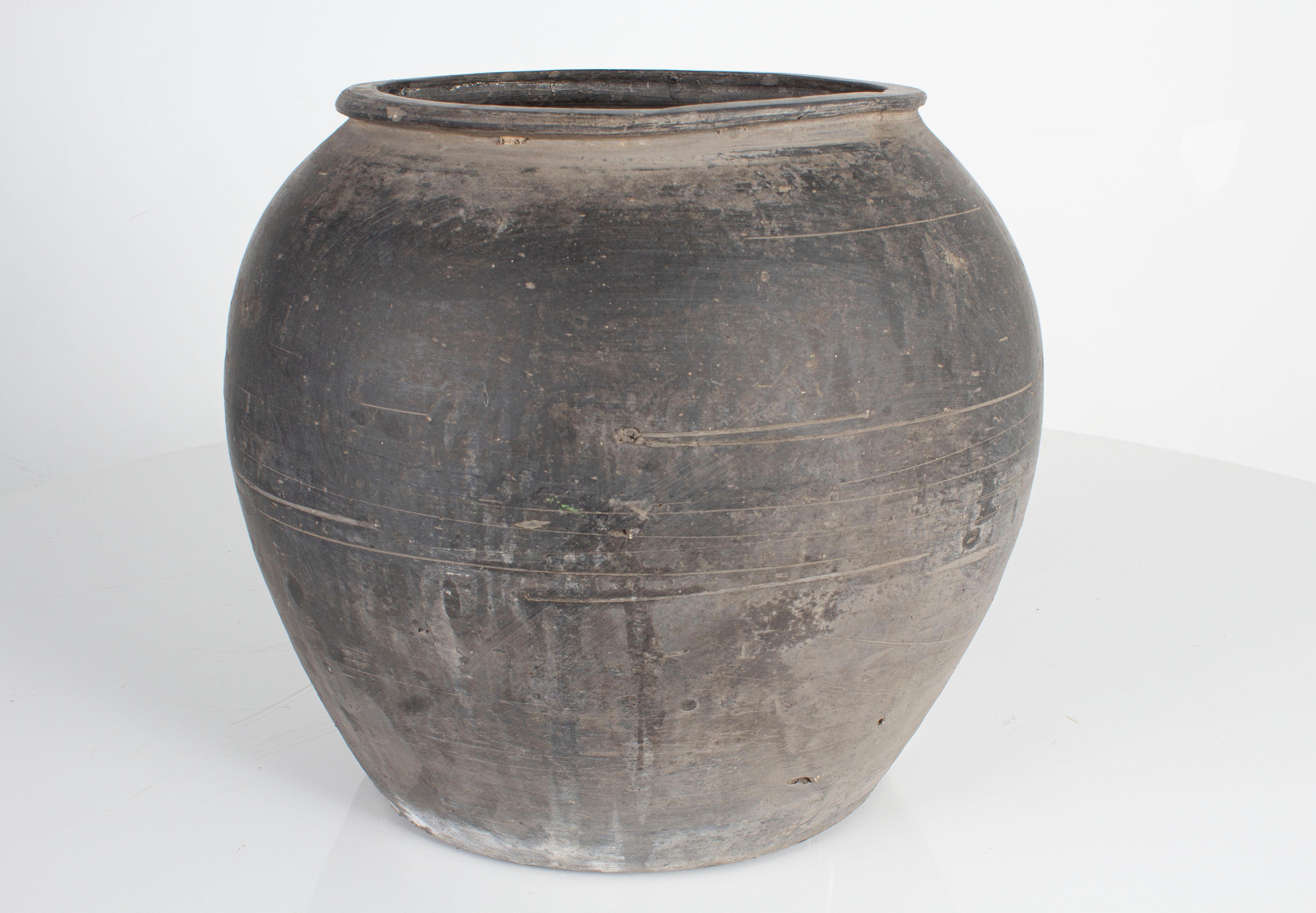 Large ceramic pot.
 
  