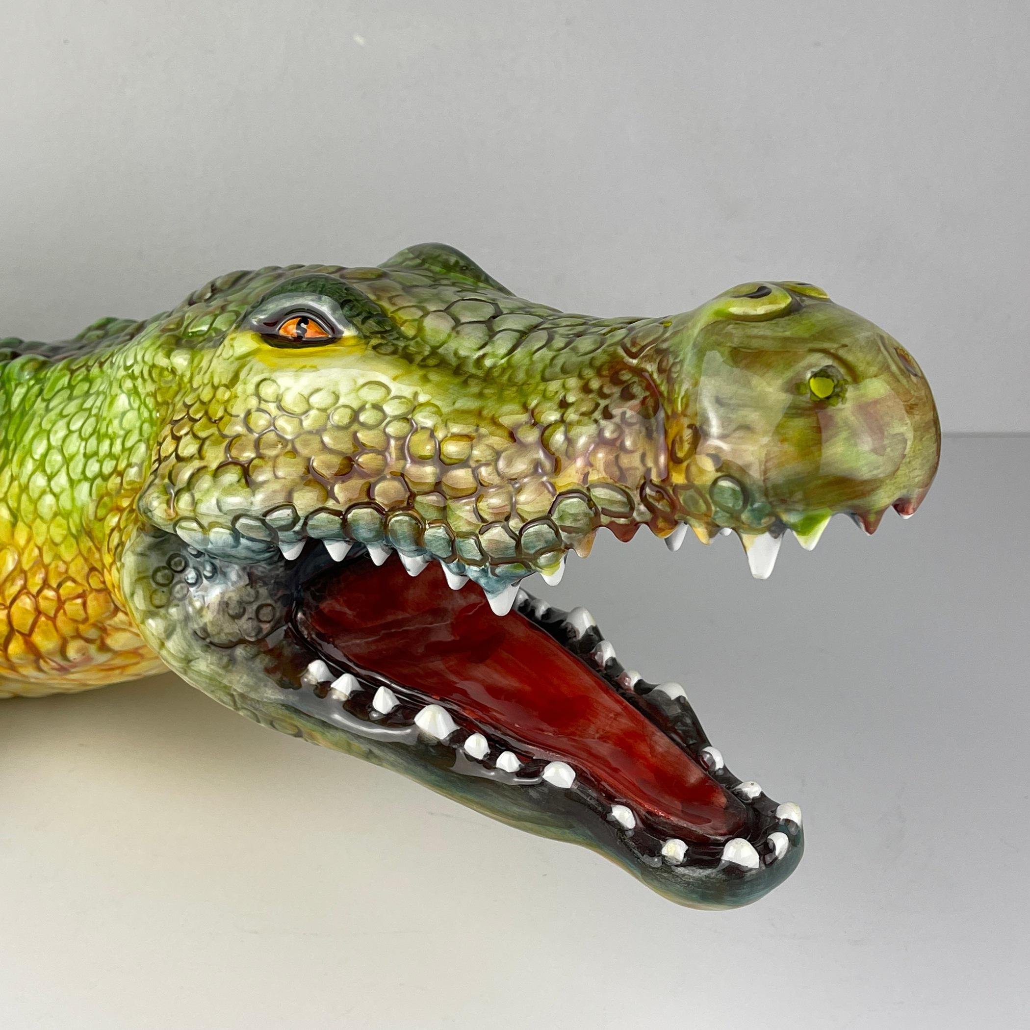 The stunning large hand painted ceramic animal sculpture of Crocodile made in Bassano Italy in the 1980s.
A very rare sculpture. In great condition.
The perfect addition to any surface and certainly to any home or even office that instantly