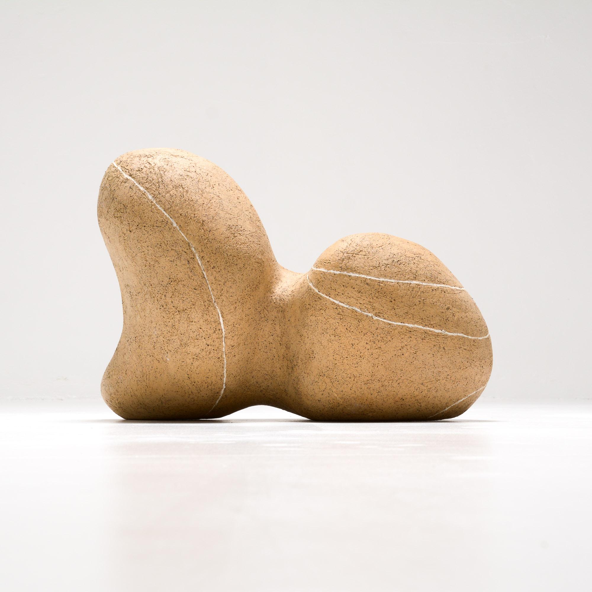 Dancing Stone 1 was created and made by Sabine Vermetten. The organic shape is inspired by dancing figures.
This ceramic sculpture is constructed from cork clay finished with white porcelain lines. The lines accentuate the shape of the