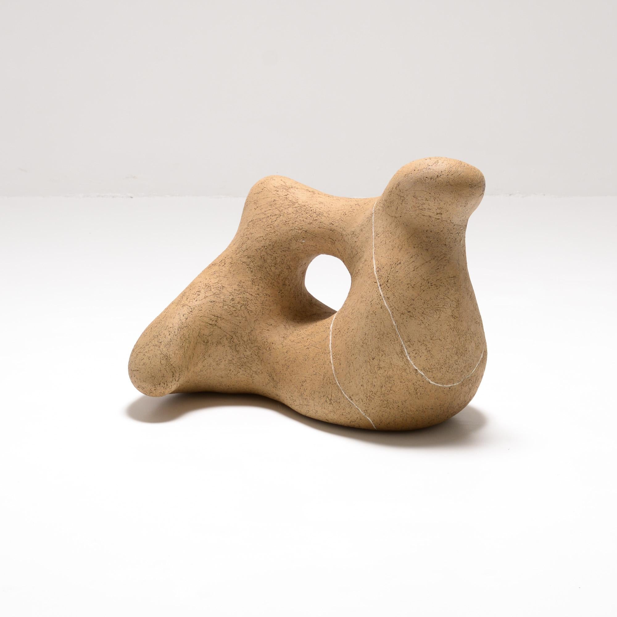 Dancing Stone 2 was created and made by Sabine Vermetten. The organic shape is inspired by dancing figures.
This ceramic sculpture is constructed from cork clay finished with white porcelain lines. The lines accentuate the shape of the